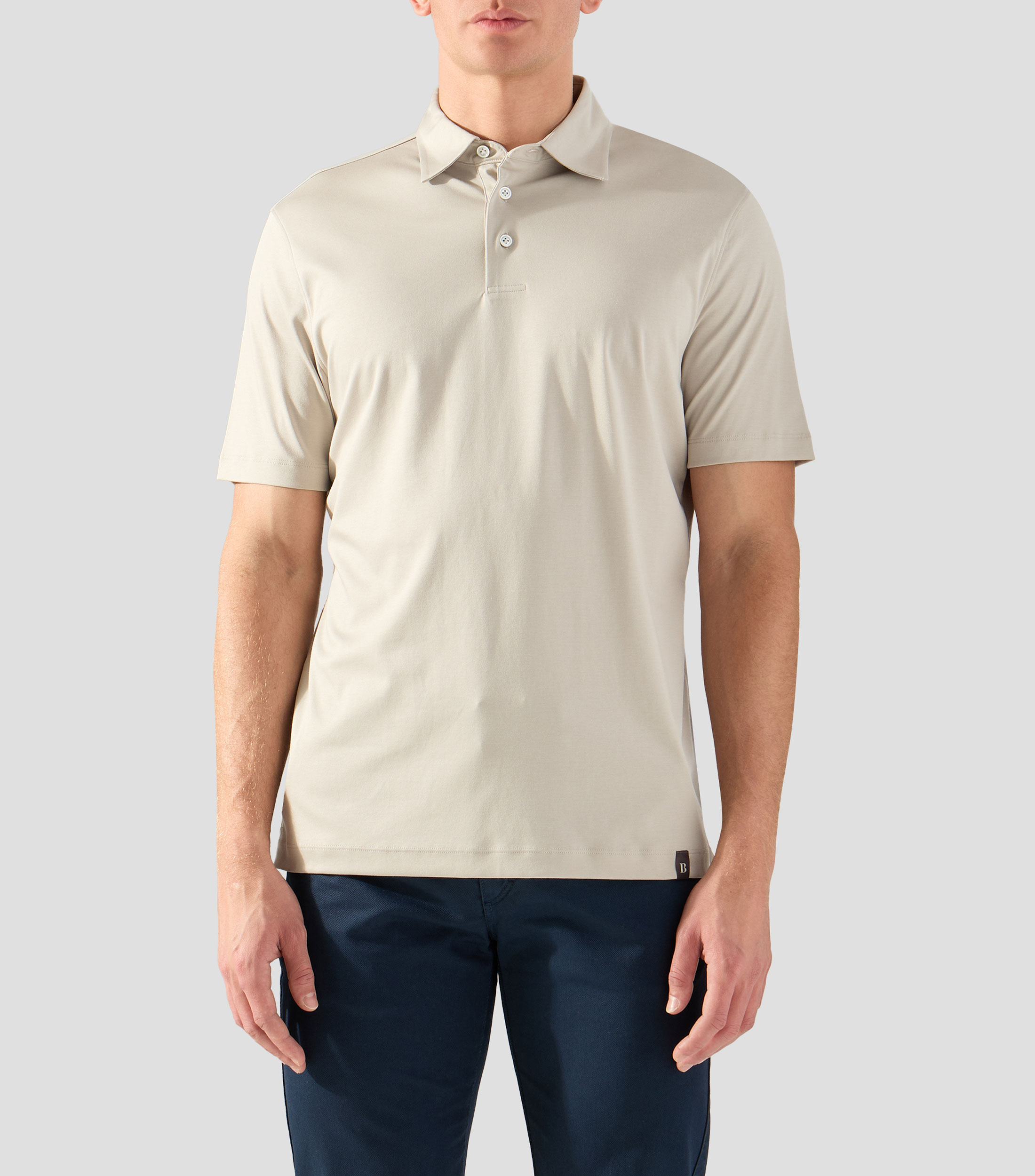 Playera tipo polo con manga corta lisa Hombre
