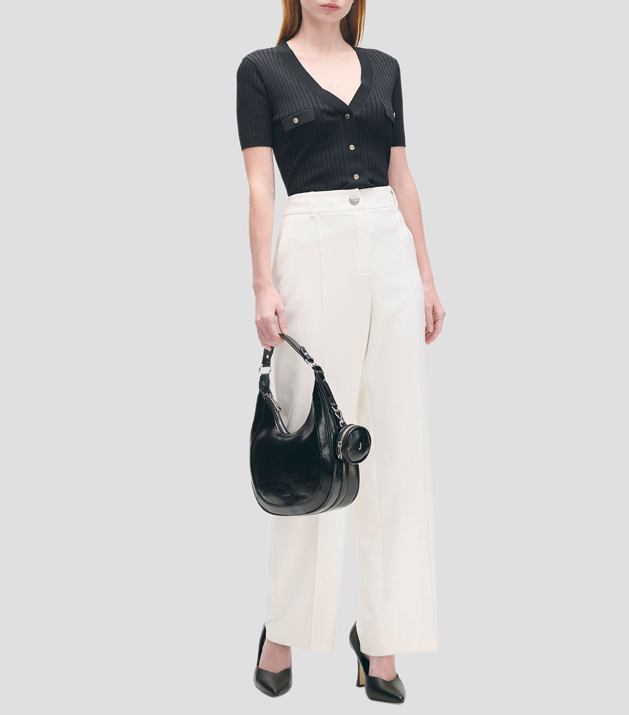Blusa tejido canalé escote V aletilla y bolsillos simulados Mujer