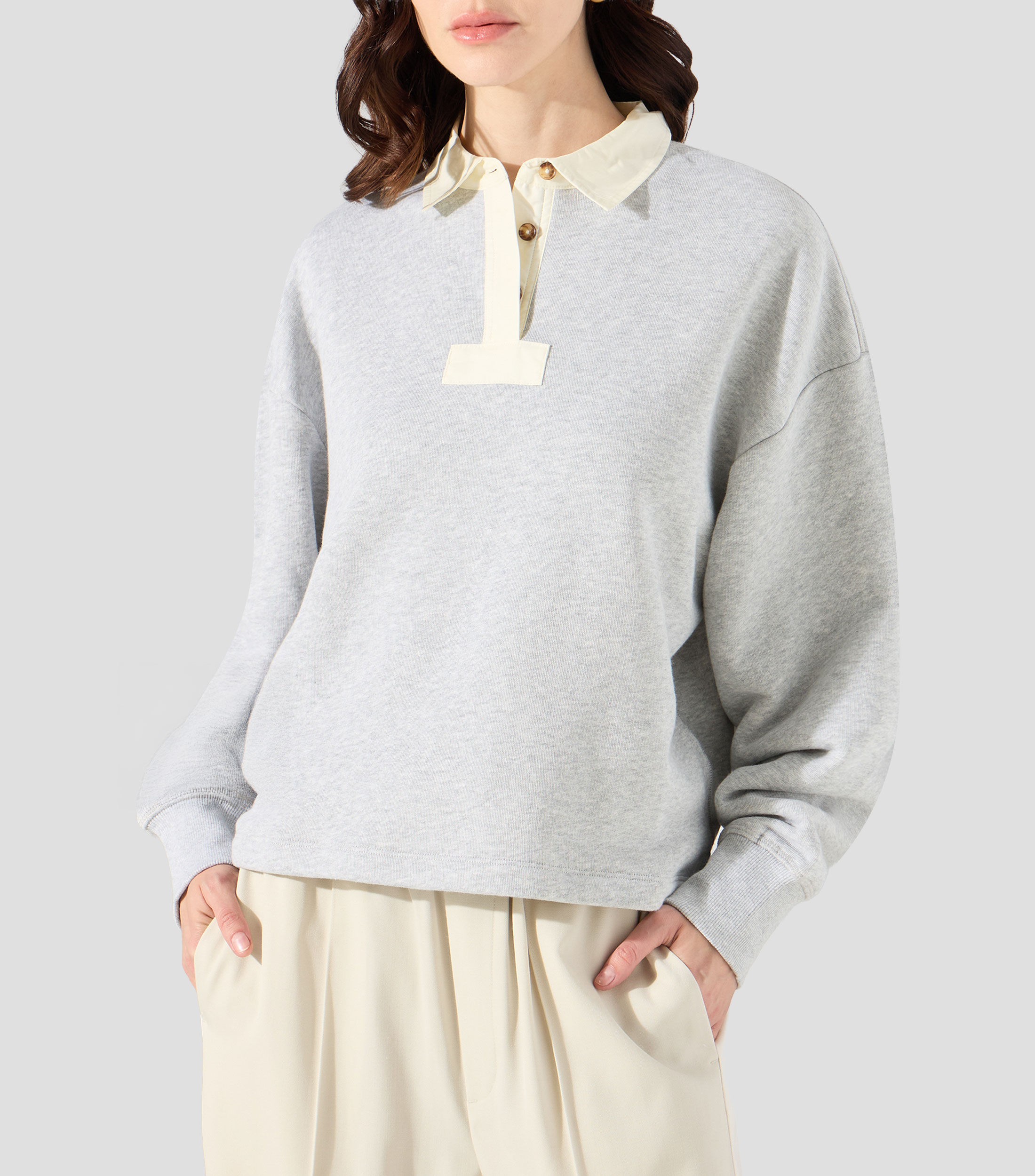 Playera tipo polo manga larga jaspeada Mujer