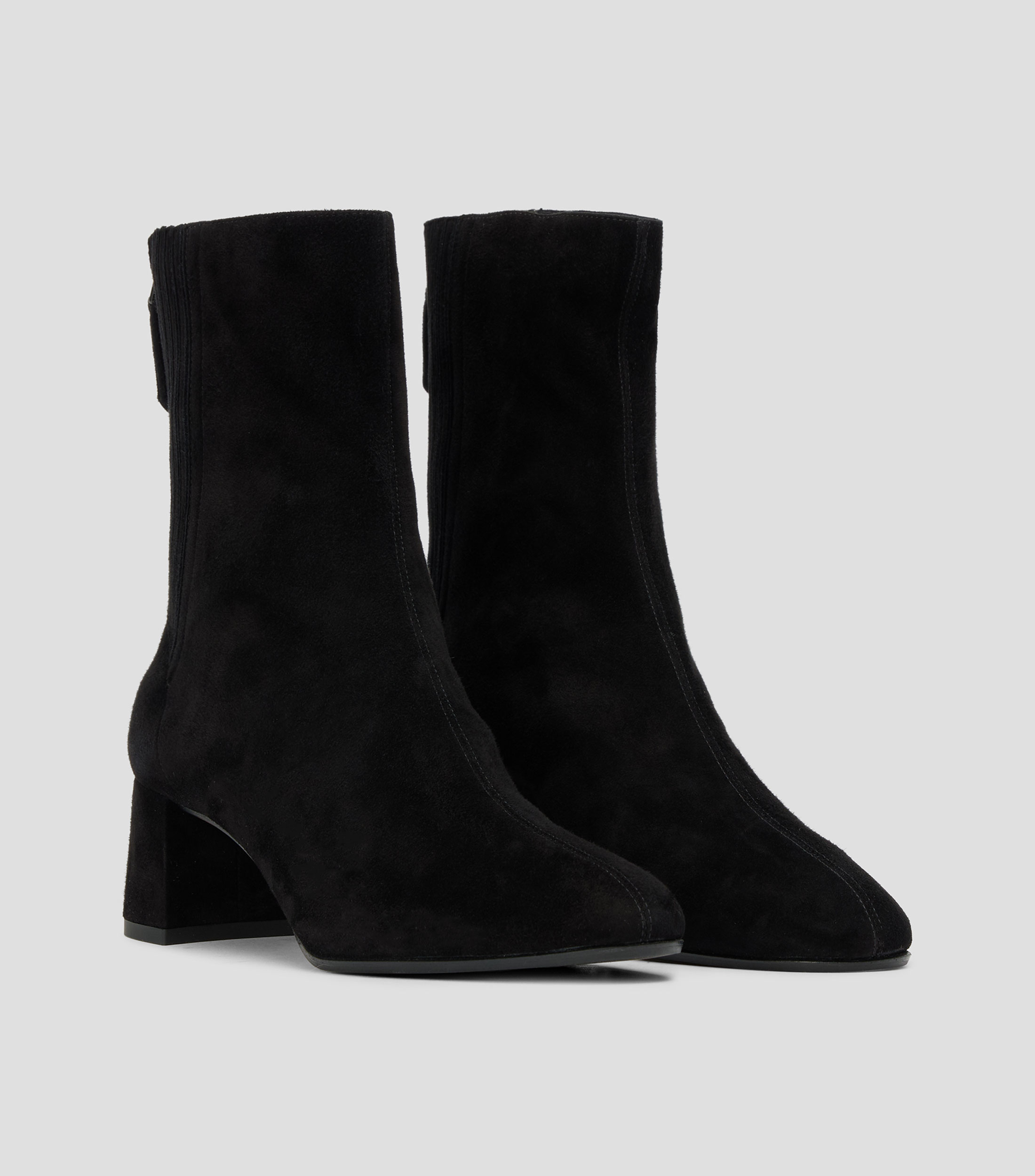 Botines con tacón bajo media luna Mujer