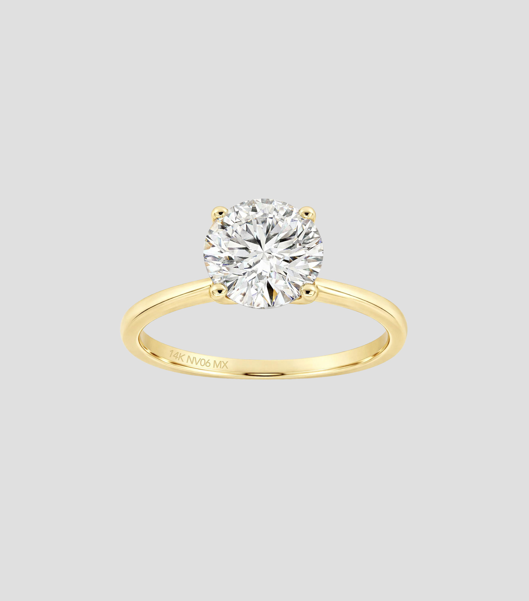 Anillo solitario en Oro amarillo de 14 Kilates con diamante Mujer