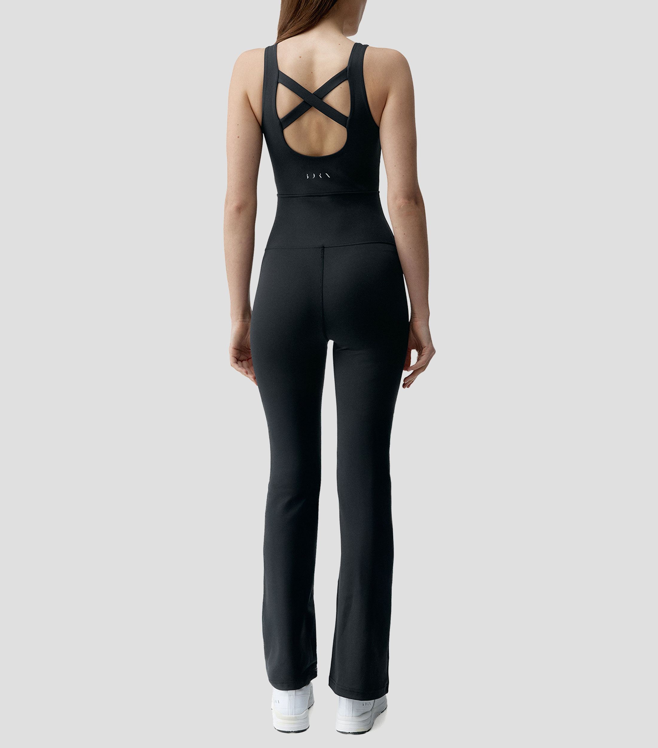 Jumpsuit para entrenamiento de corte flared Mujer