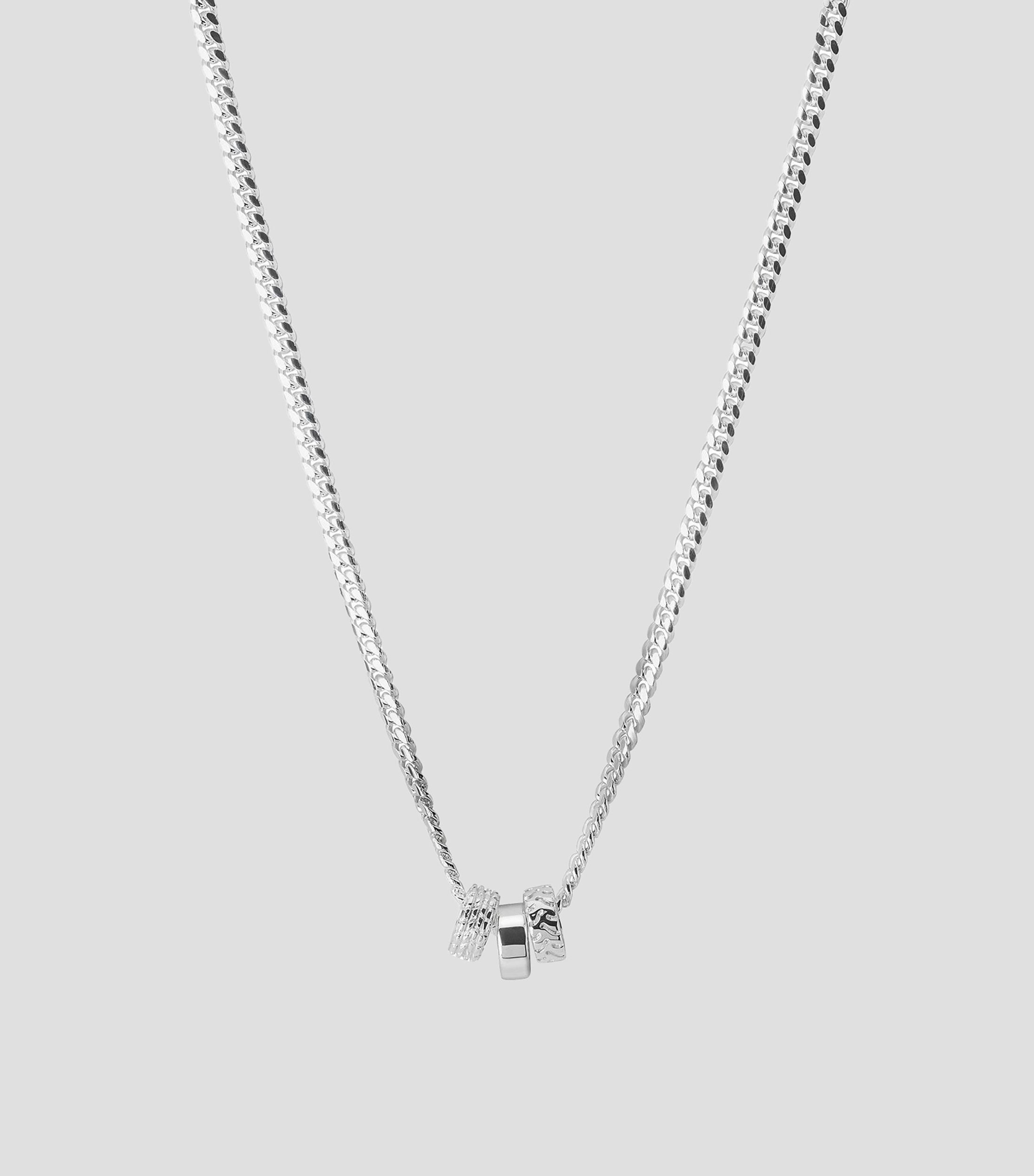 Dije en plata .925 con llantas Unisex