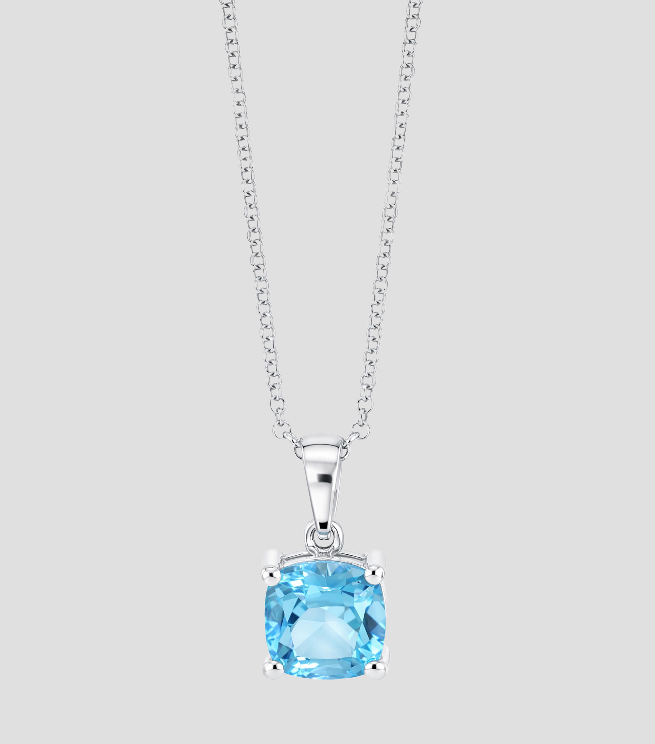 Dije con cadena en Oro blanco de 14 Kilates con Topacio azul Mujer
