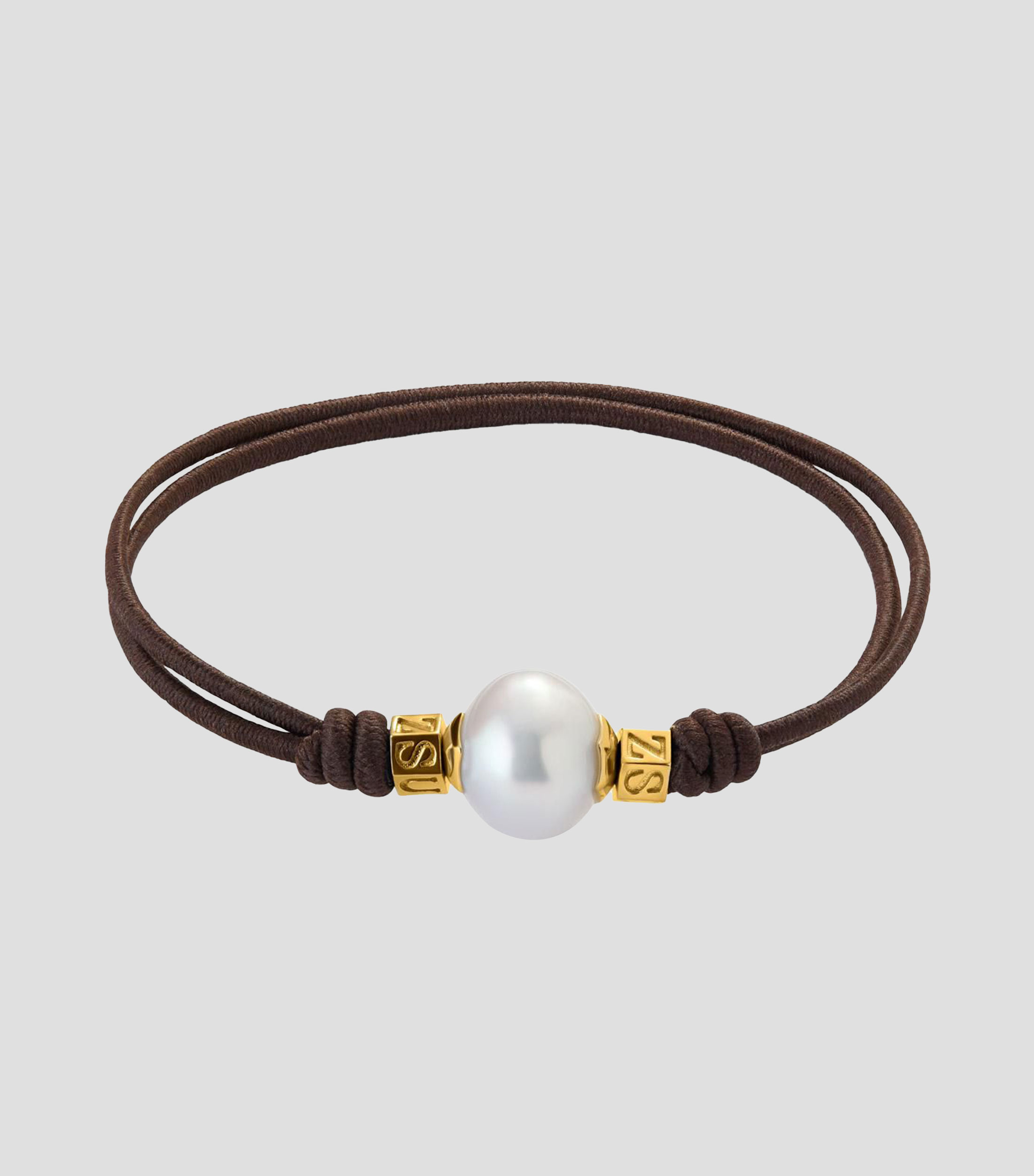 Pulsera One con perla australiana y detalles de Oro amarillo de 18 Kilates Mujer