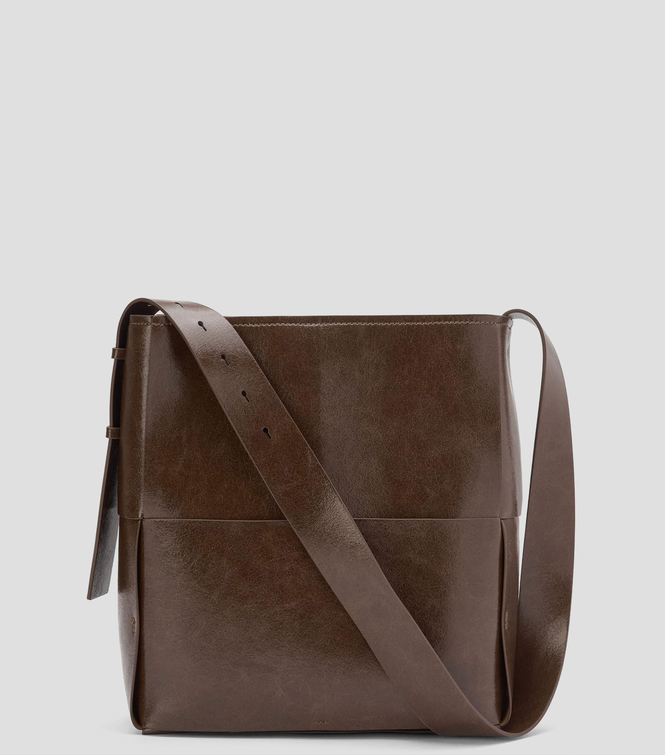 Bolsa hobo lisa con detalle texturizado Mujer