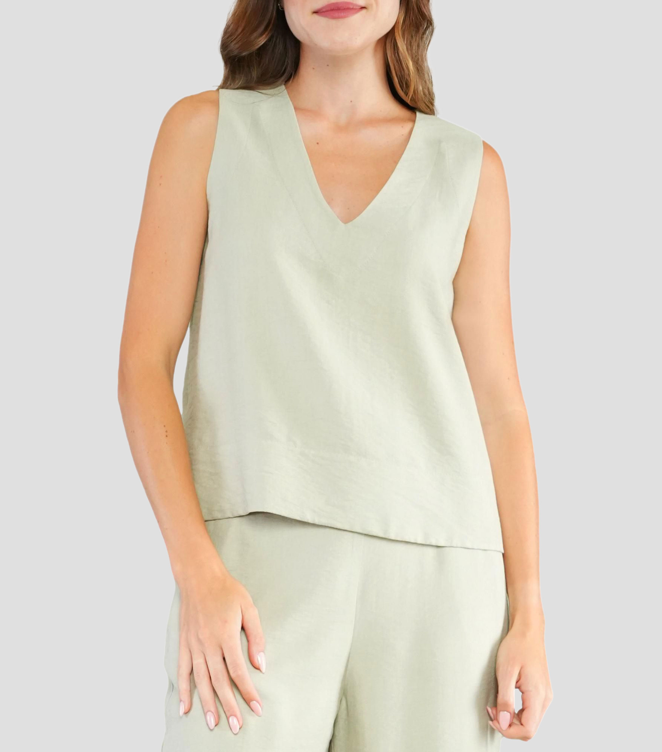 Blusa lisa sin mangas Mujer