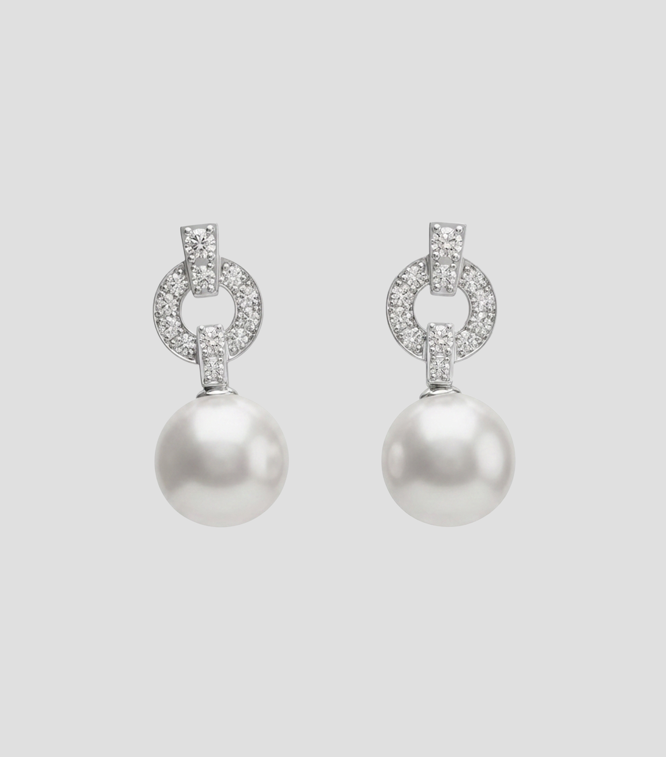 Aretes en Oro blanco de 18 Kilates con perlas Mujer