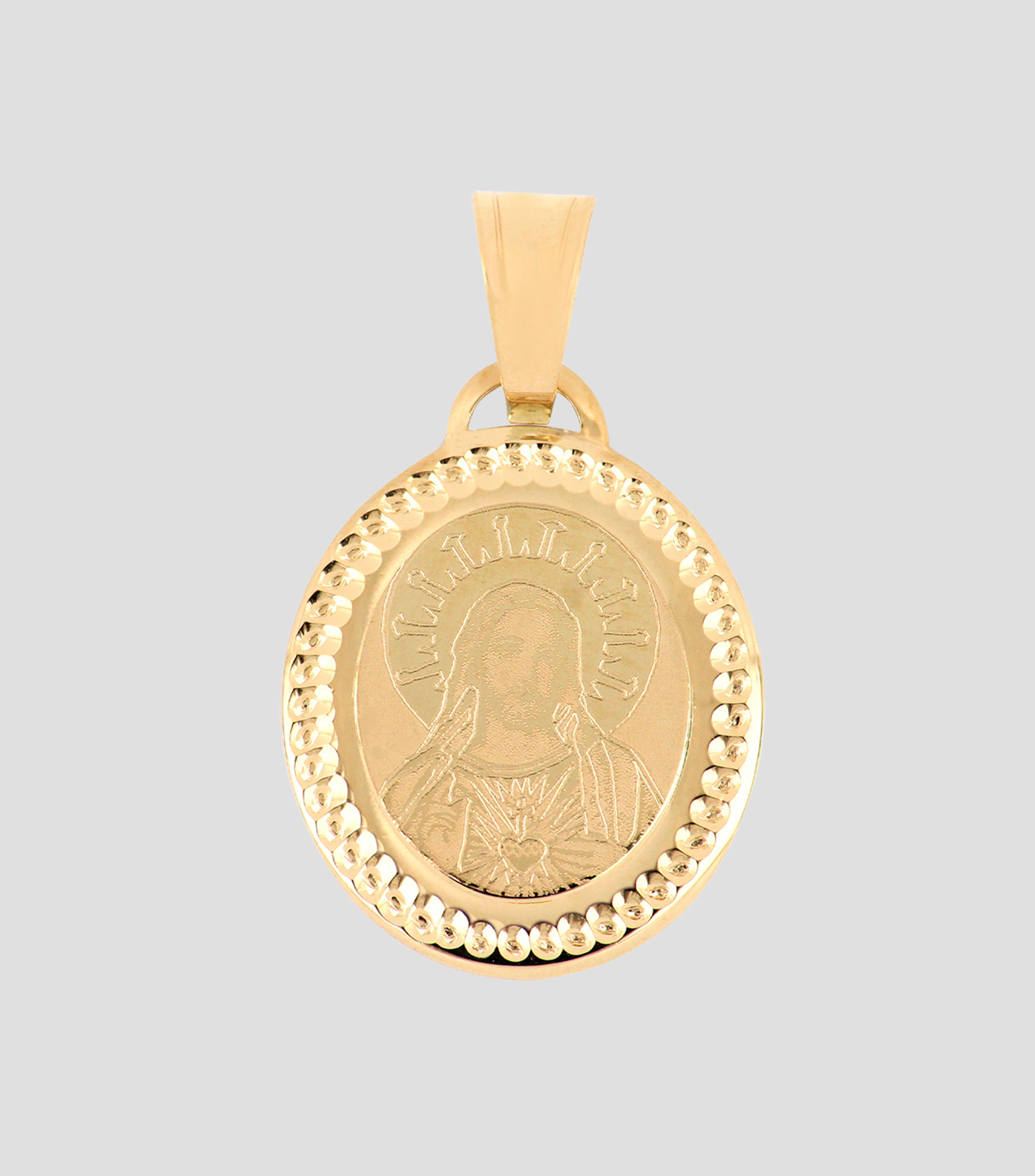 Medalla en oro amarillo 14 Kilates Sagrado Corazón Unisex