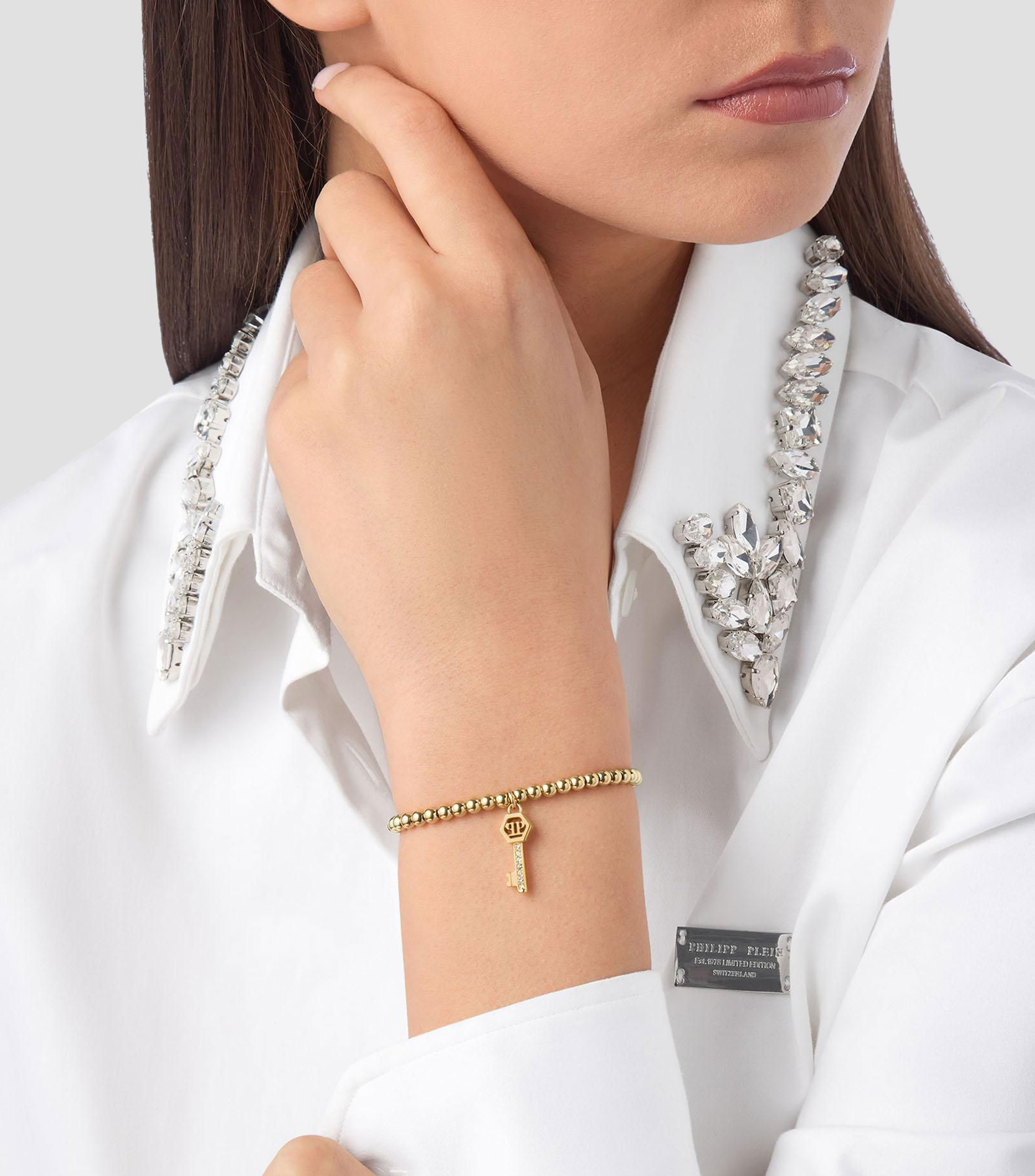 Brazalete con dije de llave Mujer