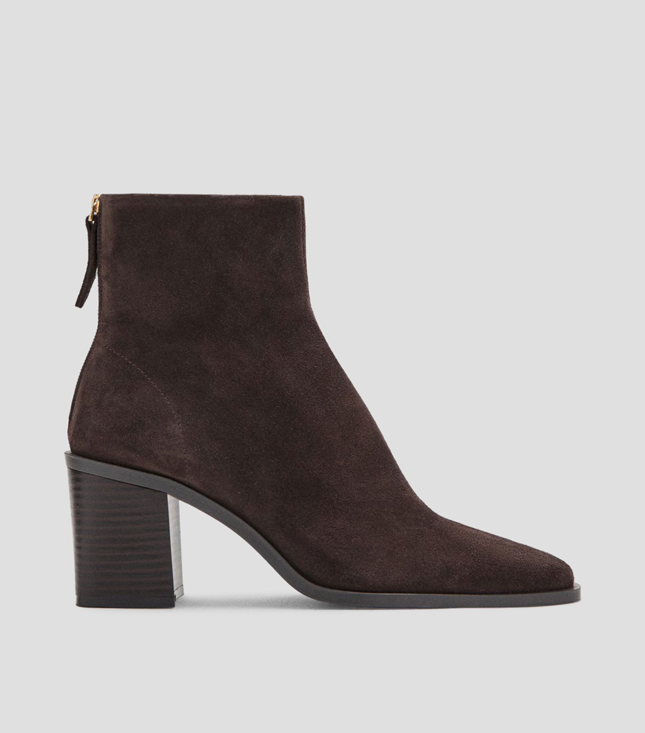 Botines casuales en piel con tacón medio y ancho Mujer