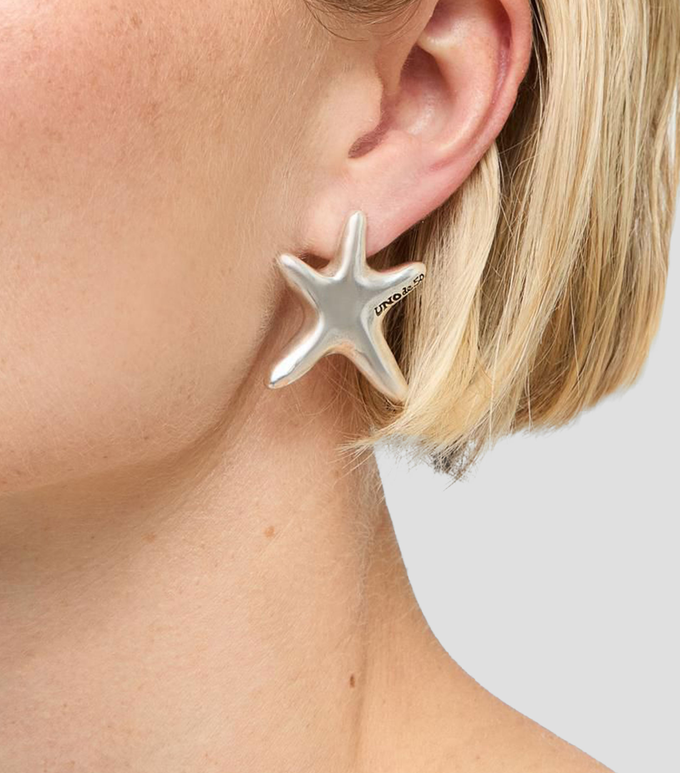 Aretes medianos estrella Arcadia Mujer