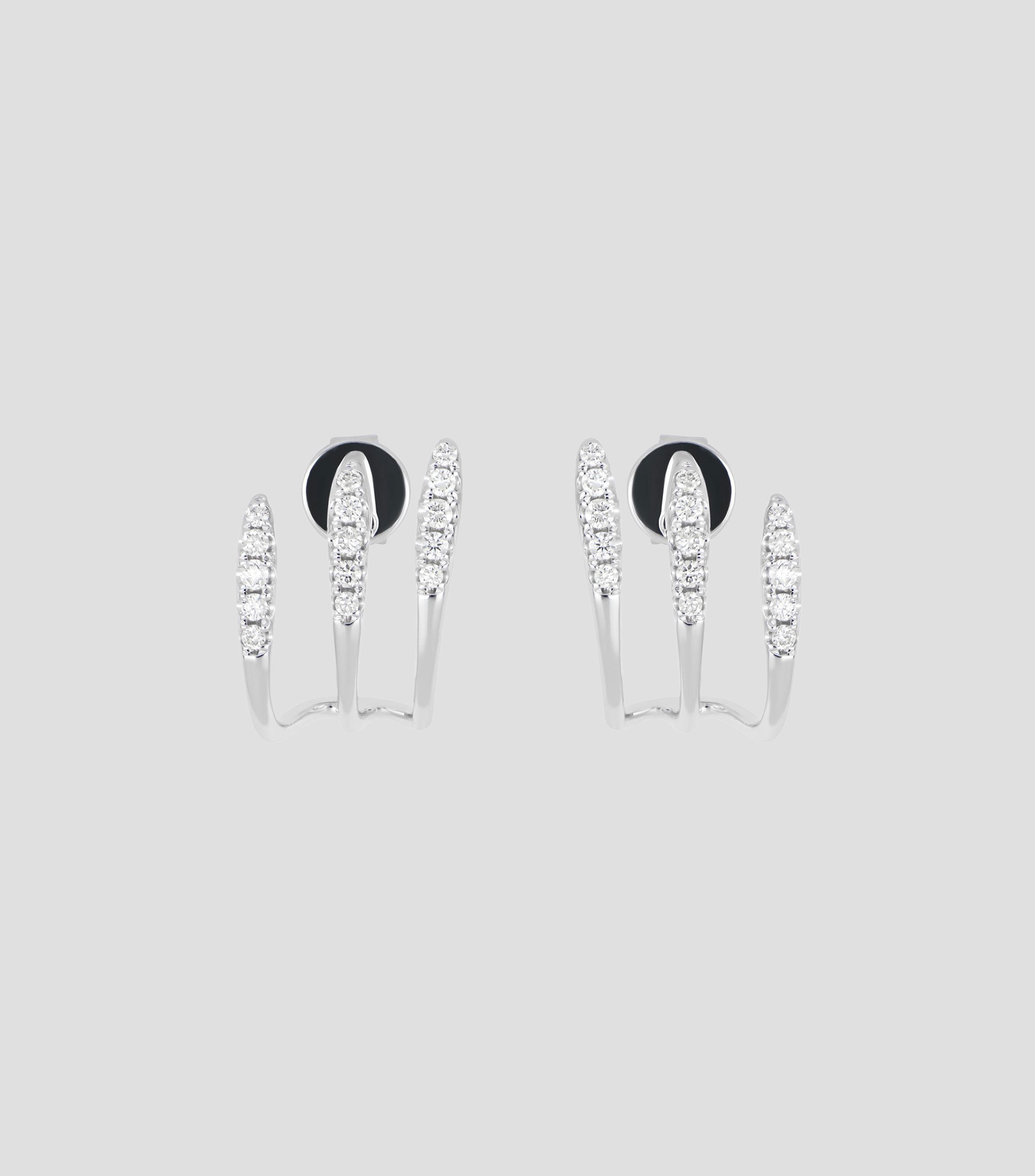 Broqueles en Oro blanco de 18 Kilates en forma de garra triple con diamantes Eugenia Mujer