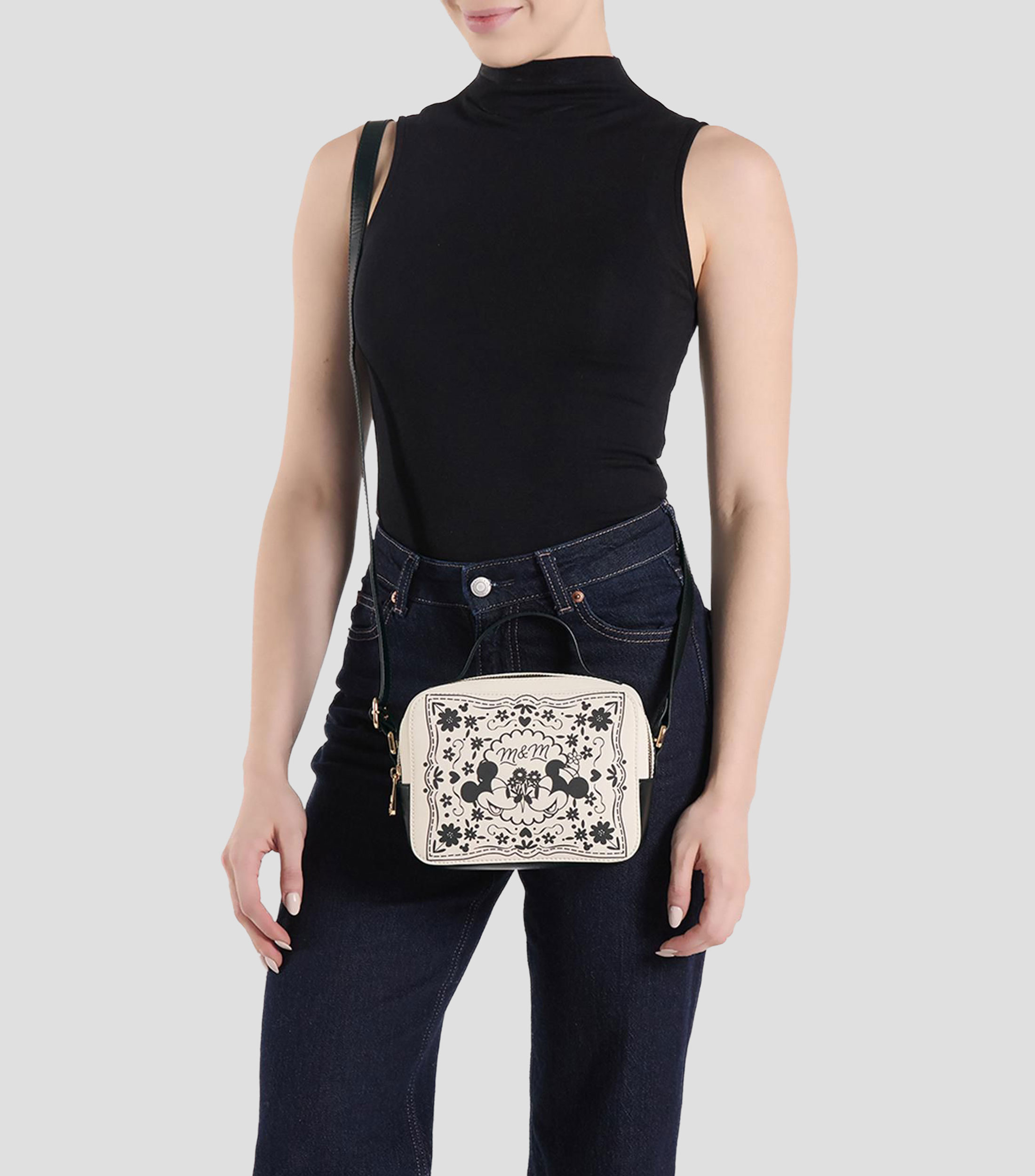 Bolsa crossbody estampada Niña