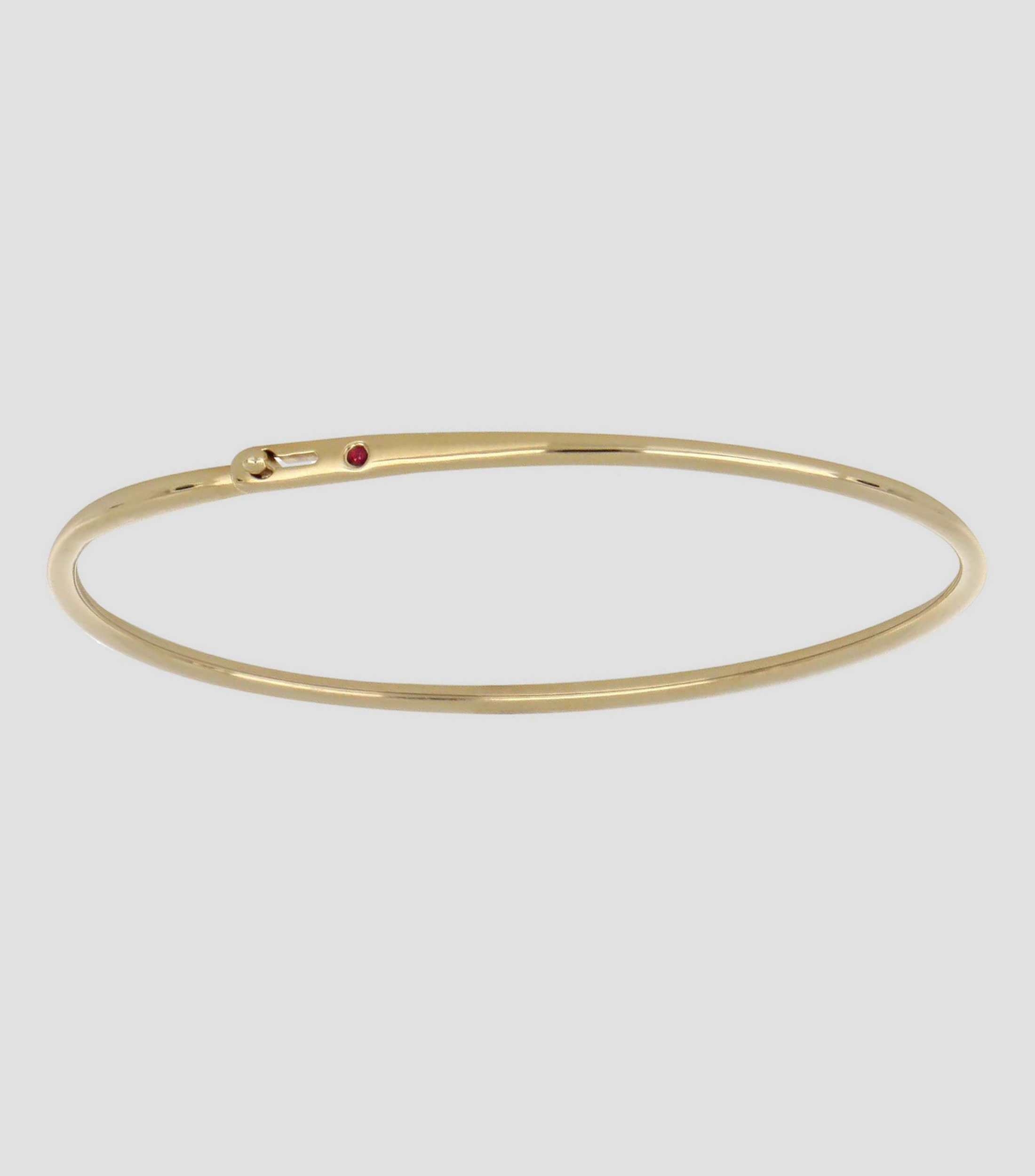 Pulsera en oro amarillo de 18 Kilates aro con rubí Mujer