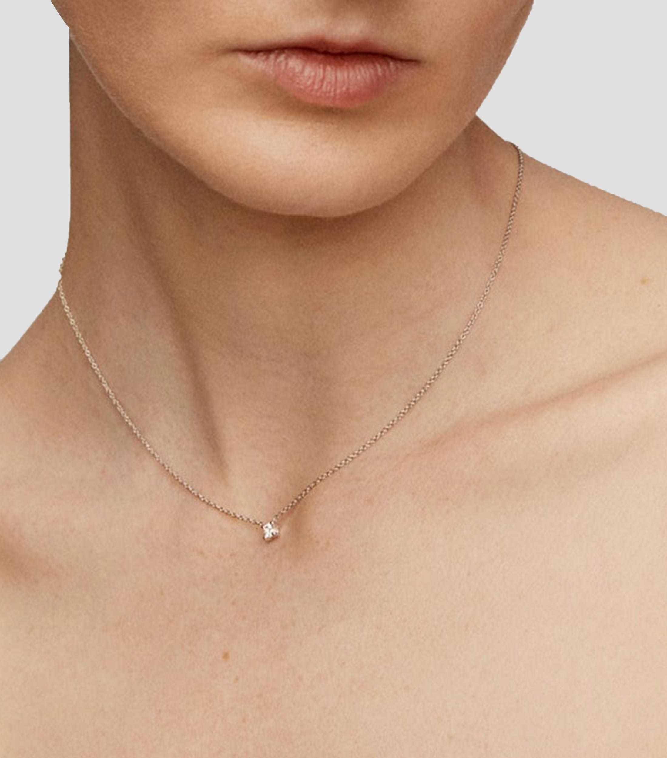 Colgante en Oro blanco de 18 Kilates con diamante Mujer