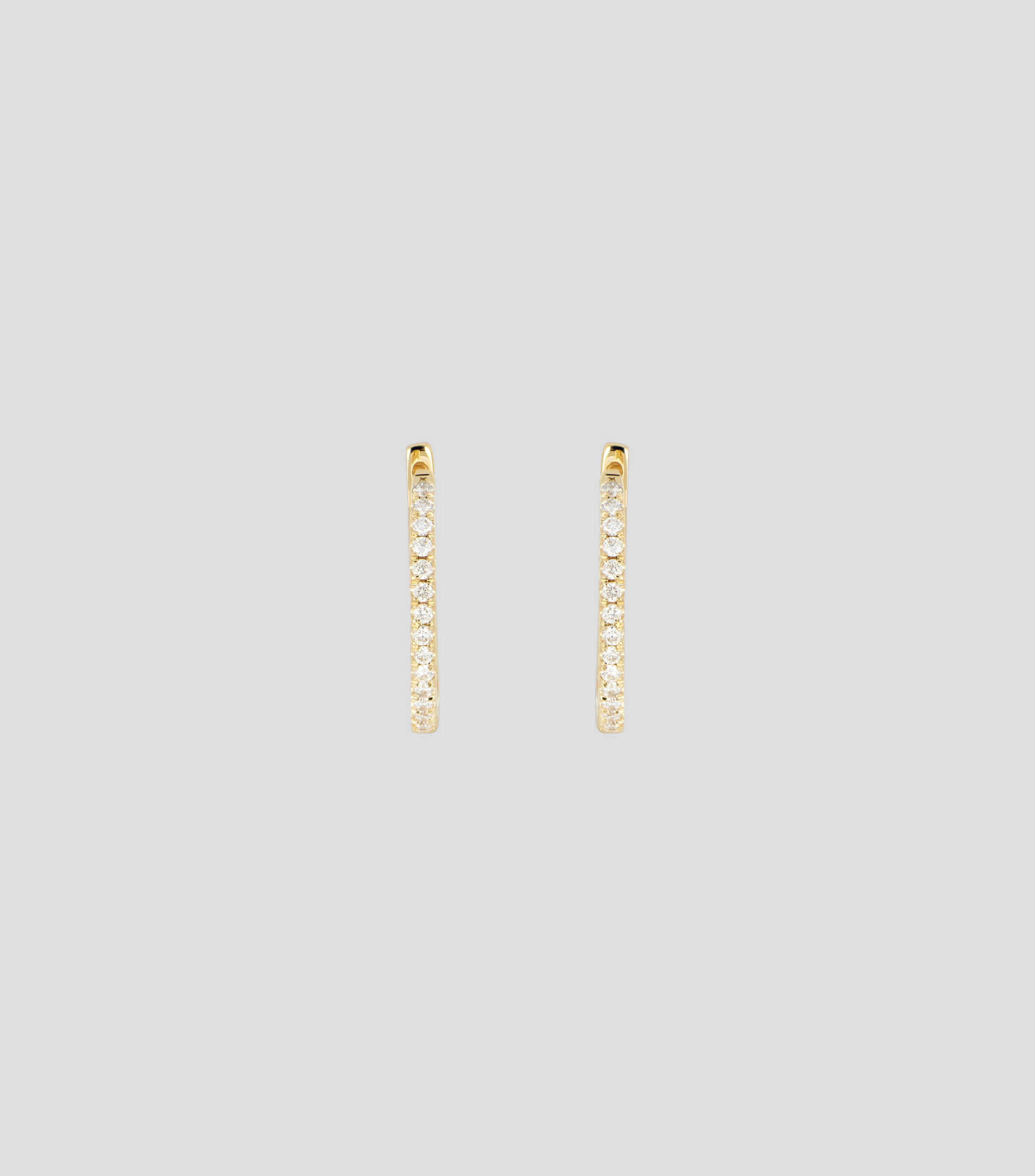 Aretes en Oro amarillo de 18 Kilates con Diamante Mujer
