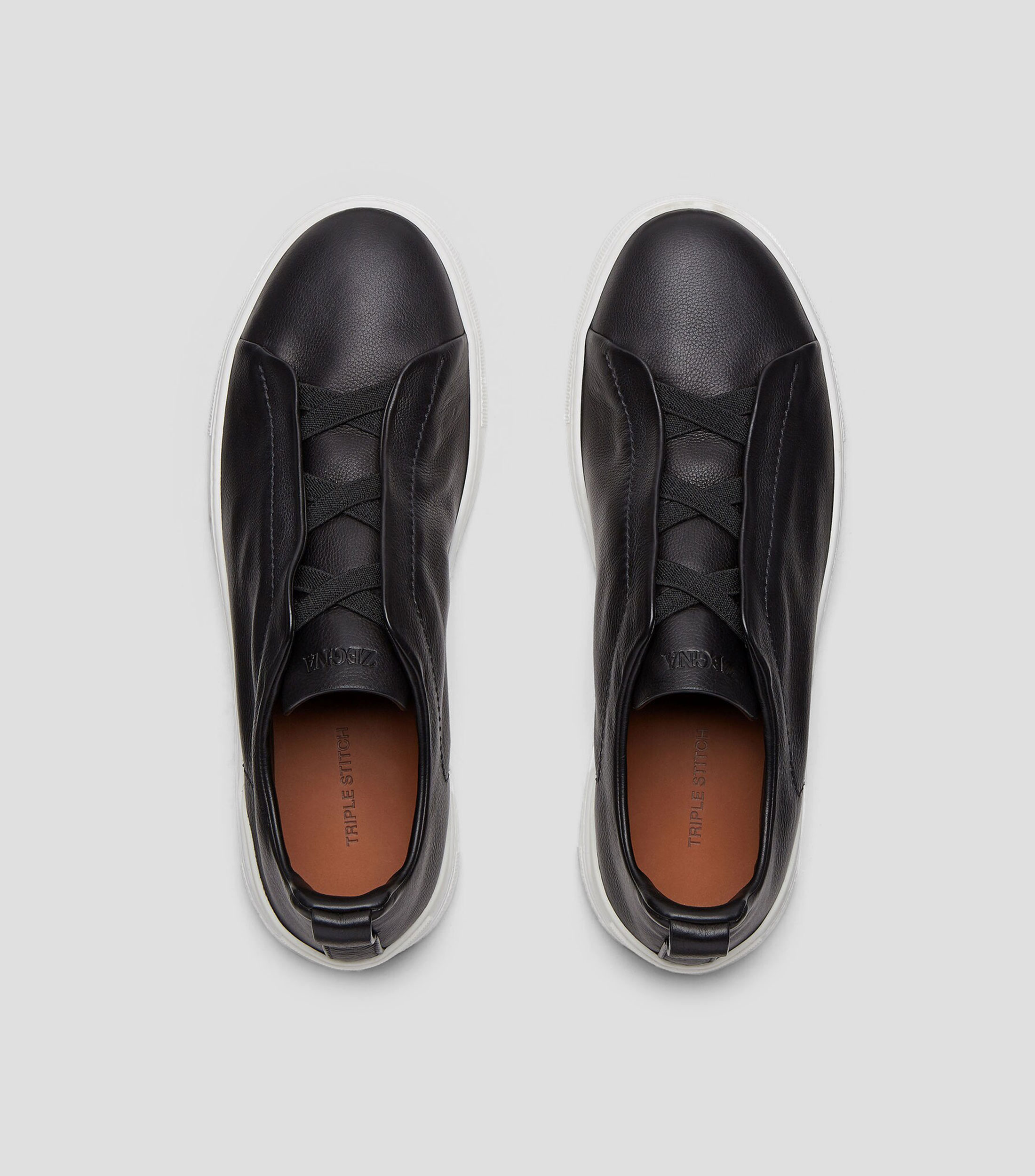 Tenis casuales Triple Stitch en piel Hombre