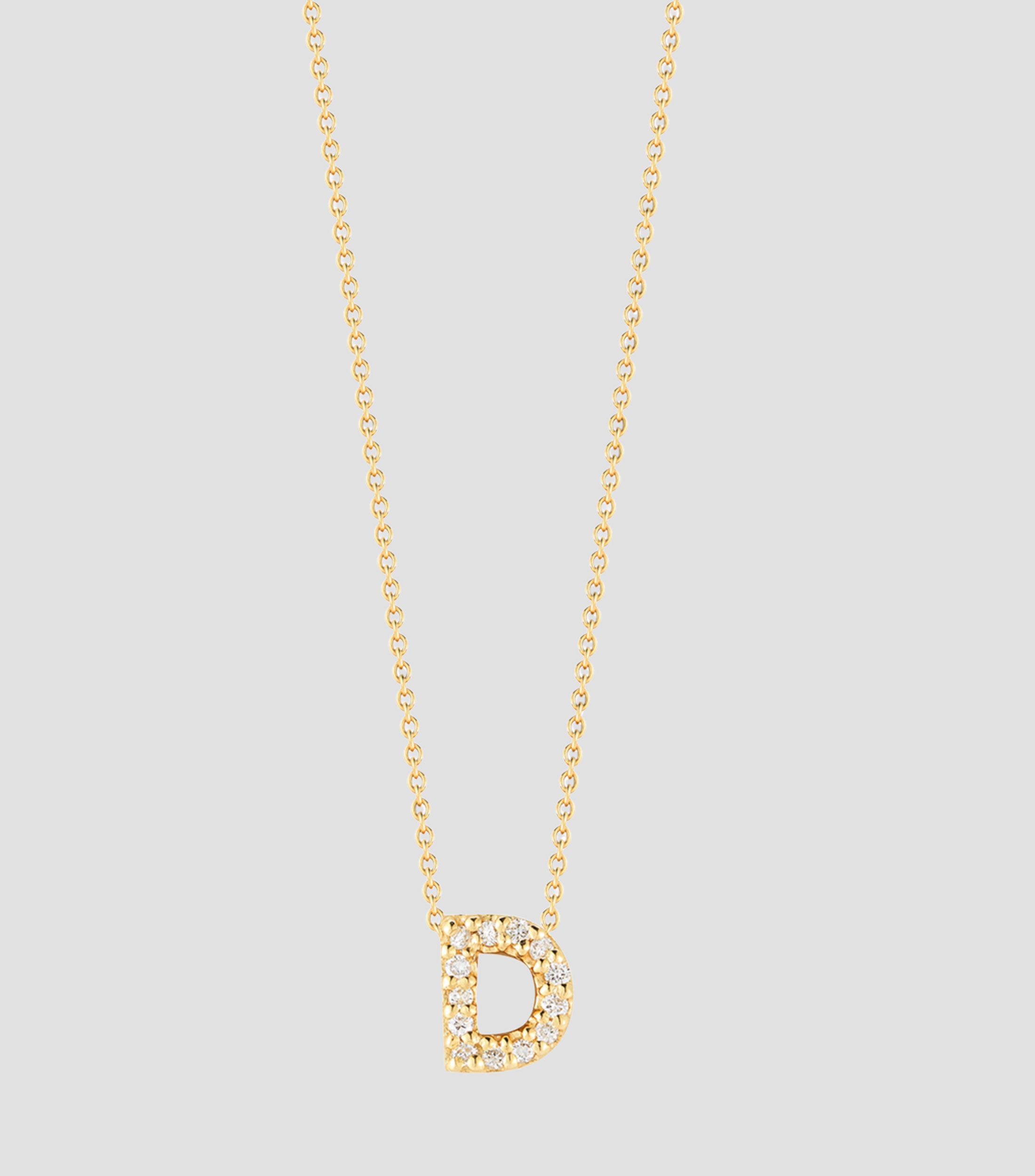 Collar en Oro de 18 Kilates letra D con diamantes Mujer