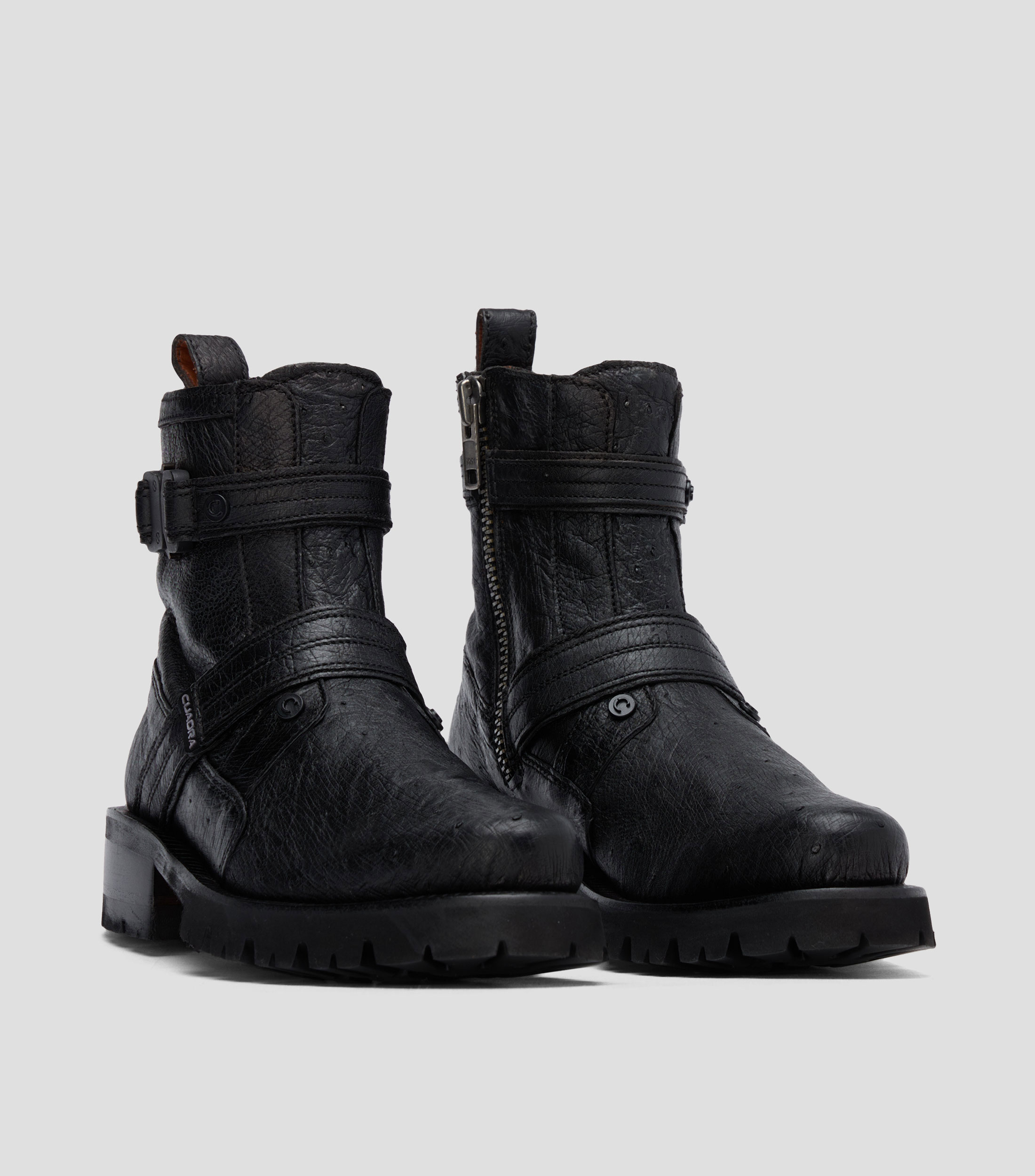 Botines en piel con correas Hombre