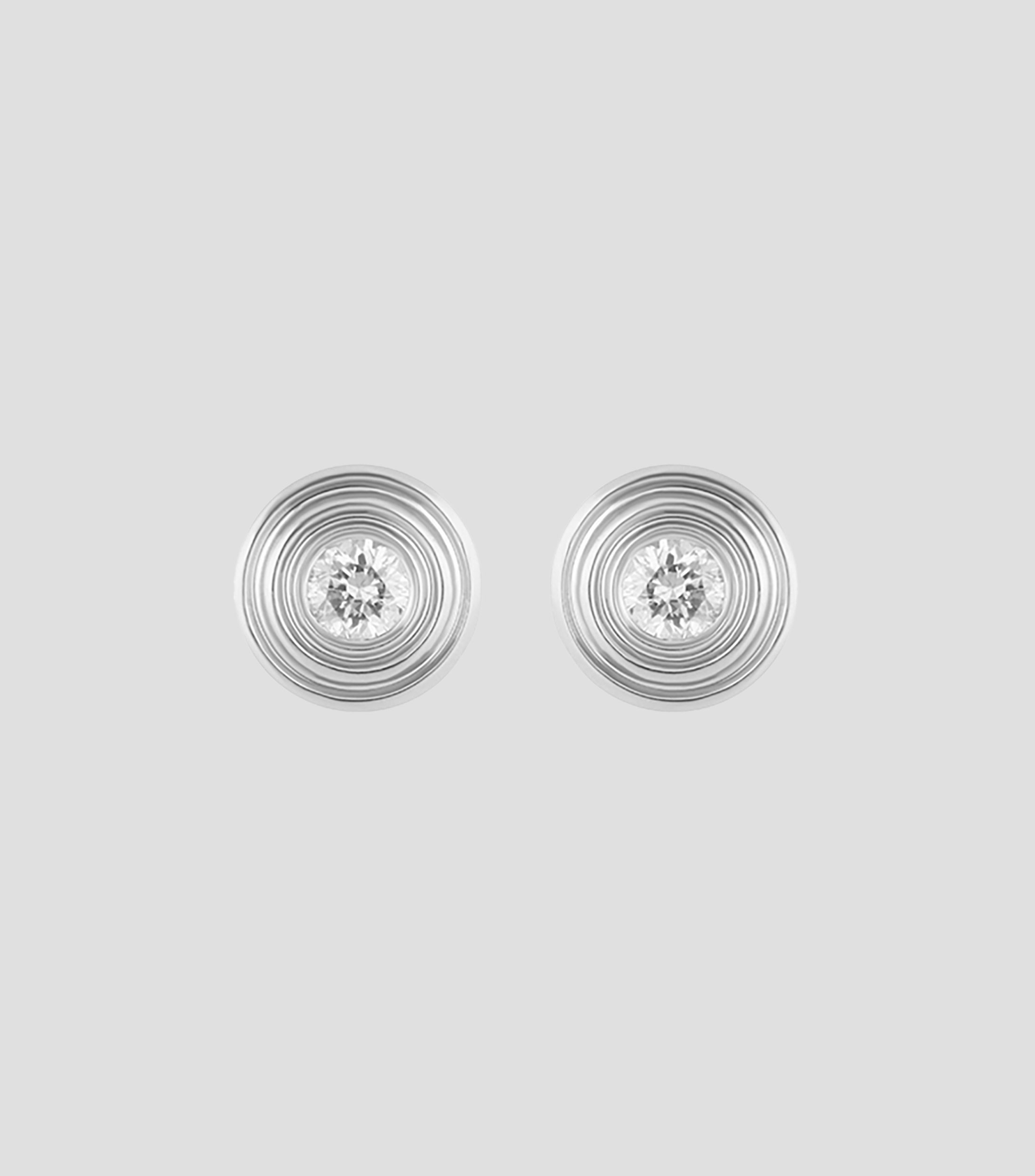 Aretes en oro blanco de 18 kilates con diamantes Mujer