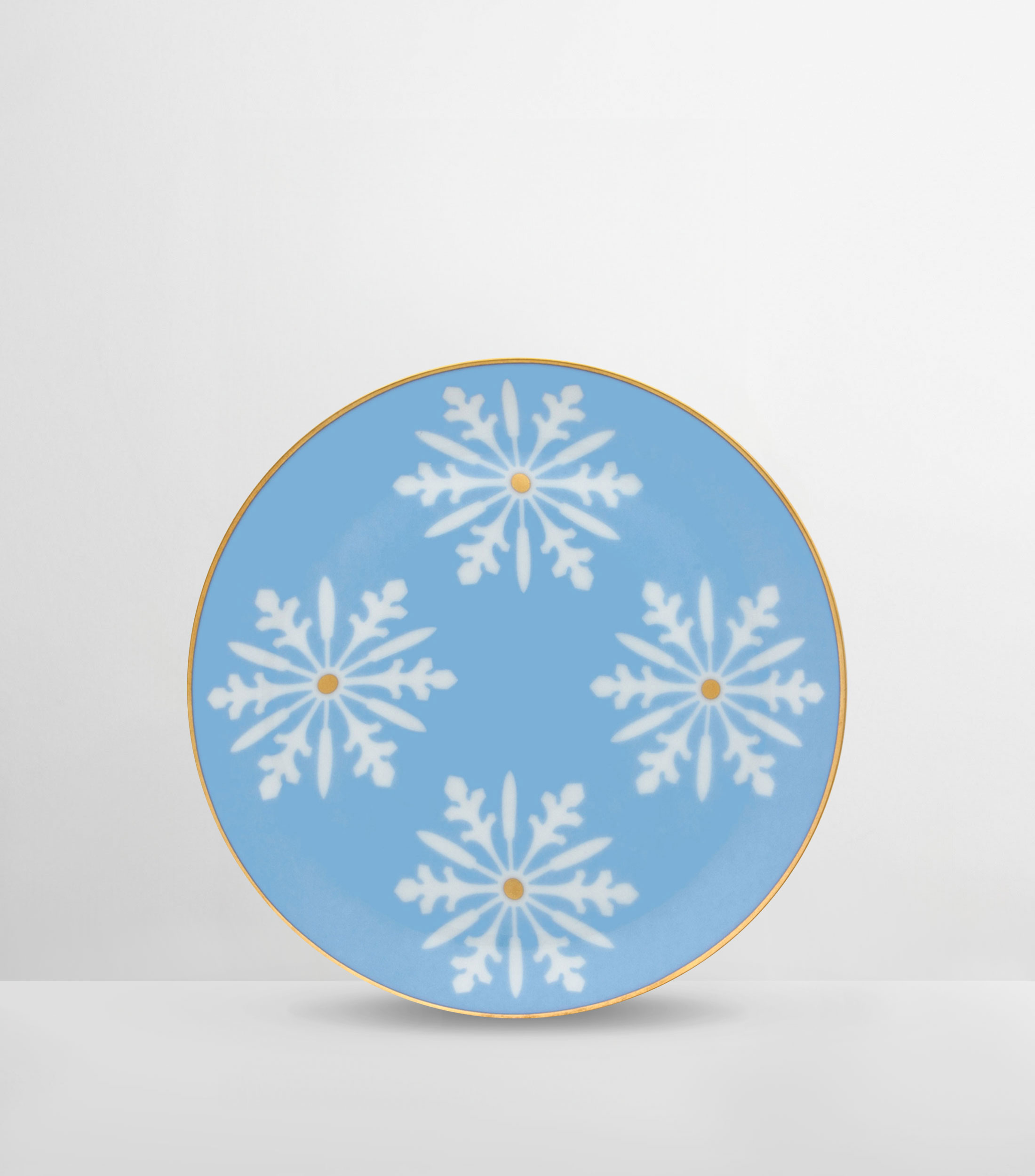 Plato con copos de nieve en porcelana