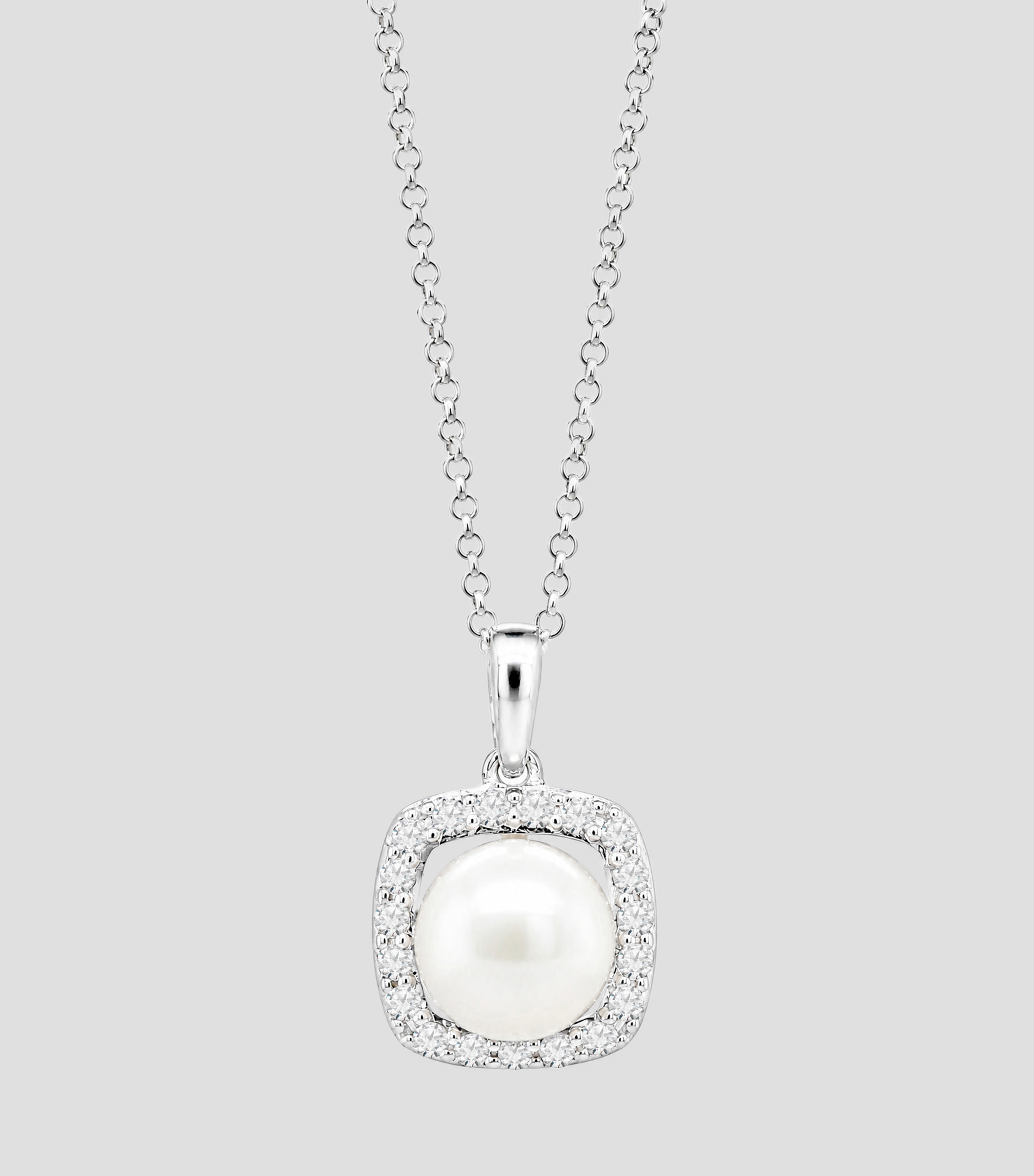 Dije con cadena en Oro blanco de 14 Kilates con perla Mujer