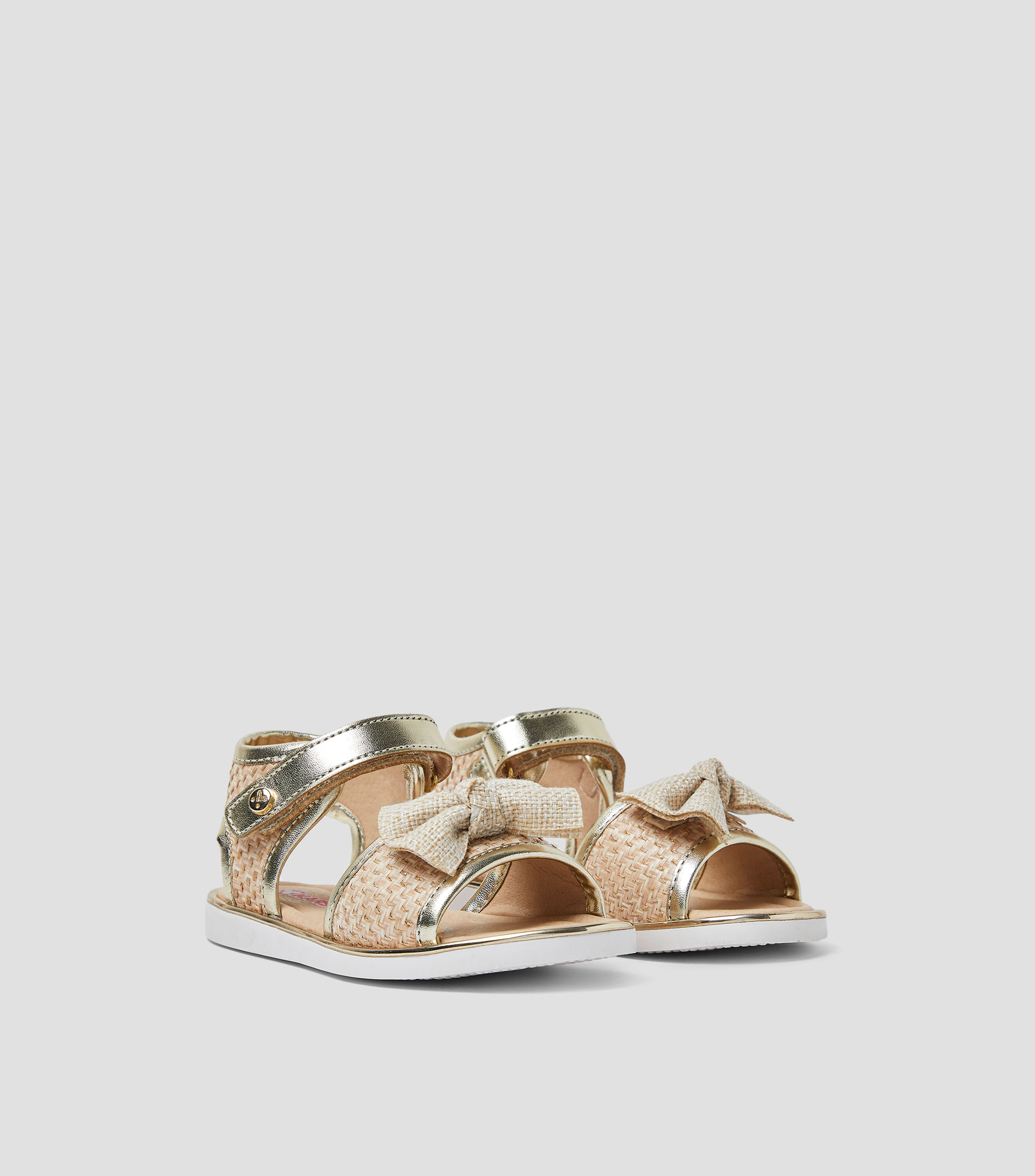 Sandalias planas con moño Niña