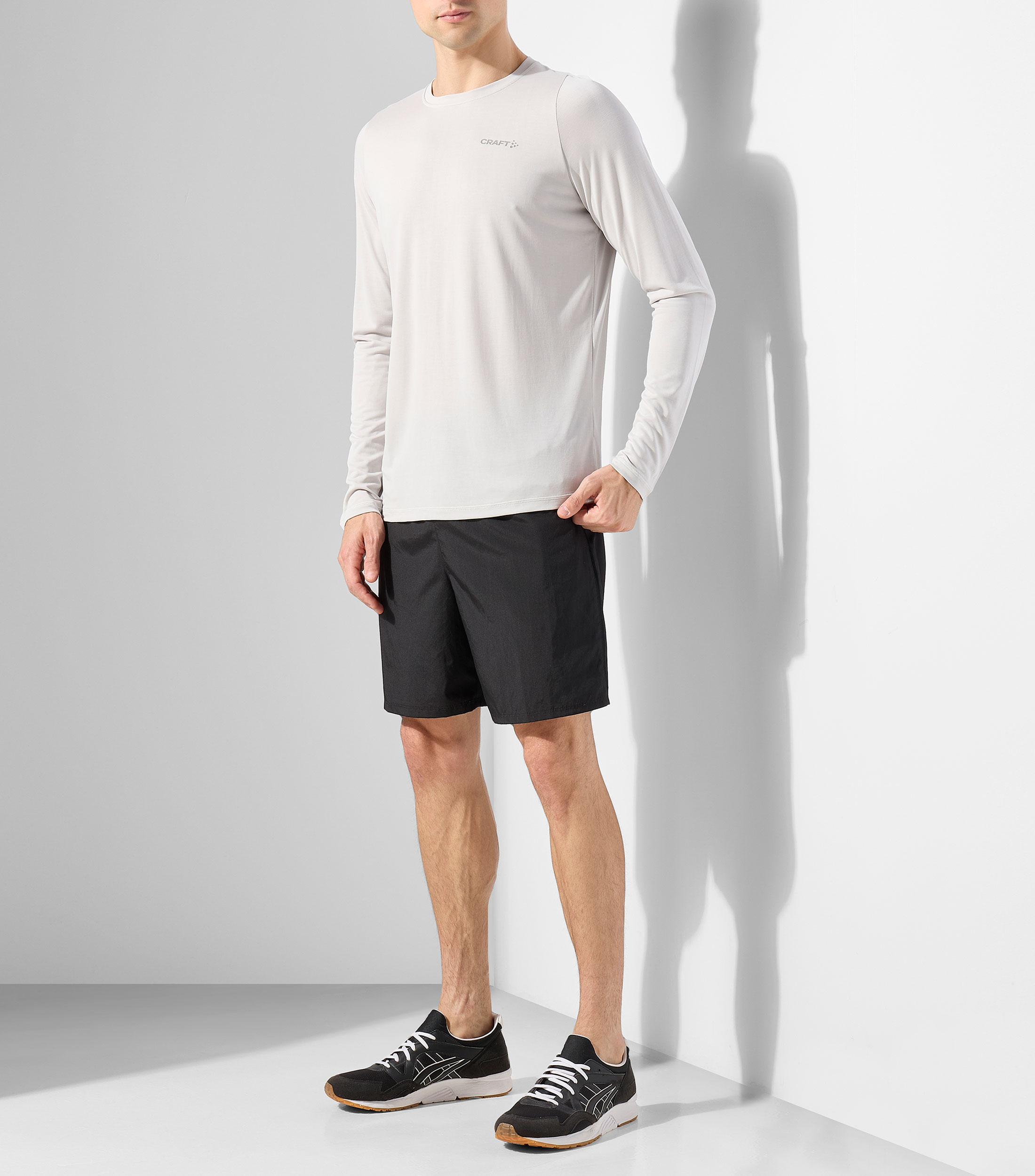 Playera para correr de cuello redondo con manga larga estampada Hombre