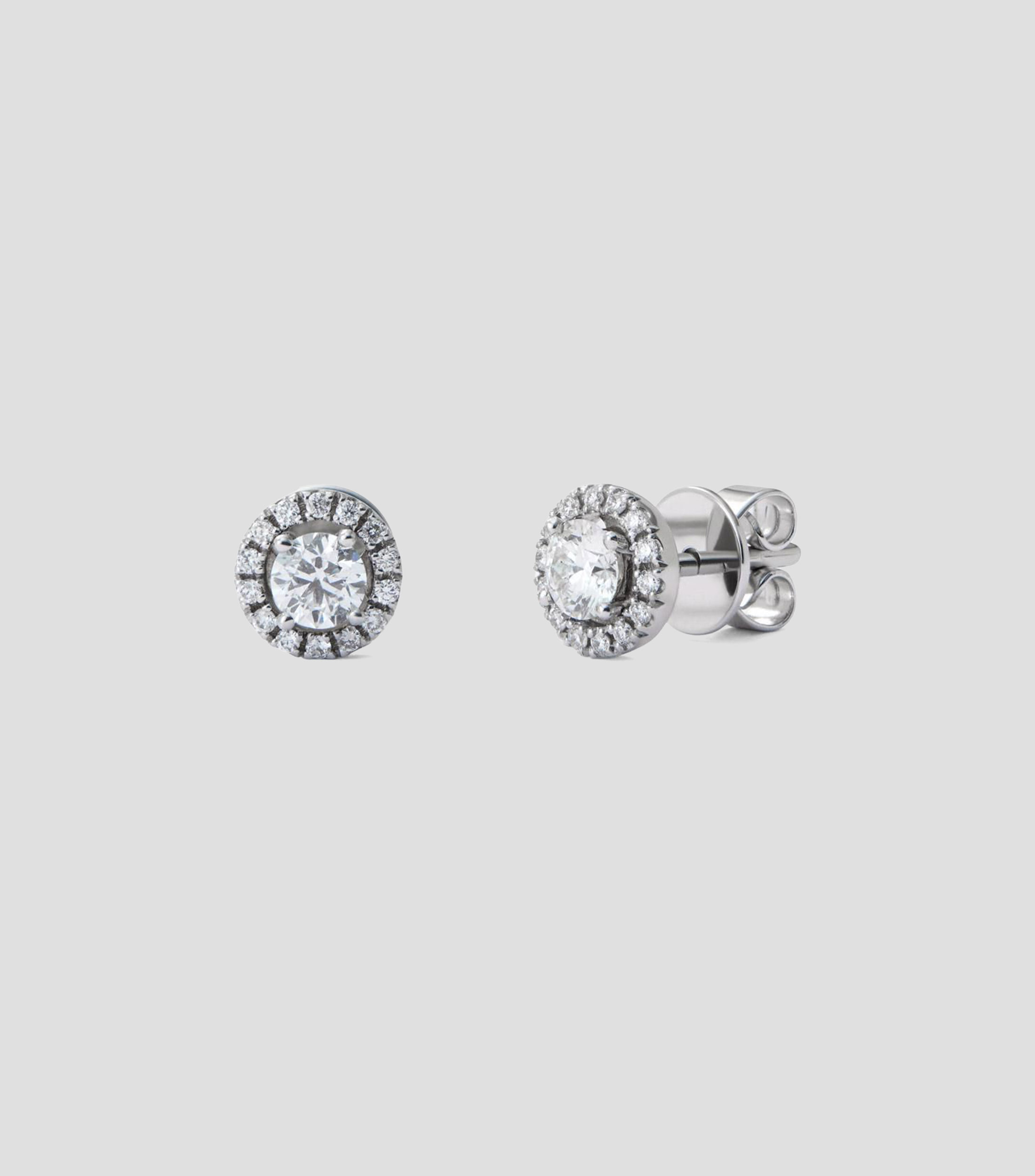 Aretes en Oro blanco de 18 Kilates botón con diamantes Mujer