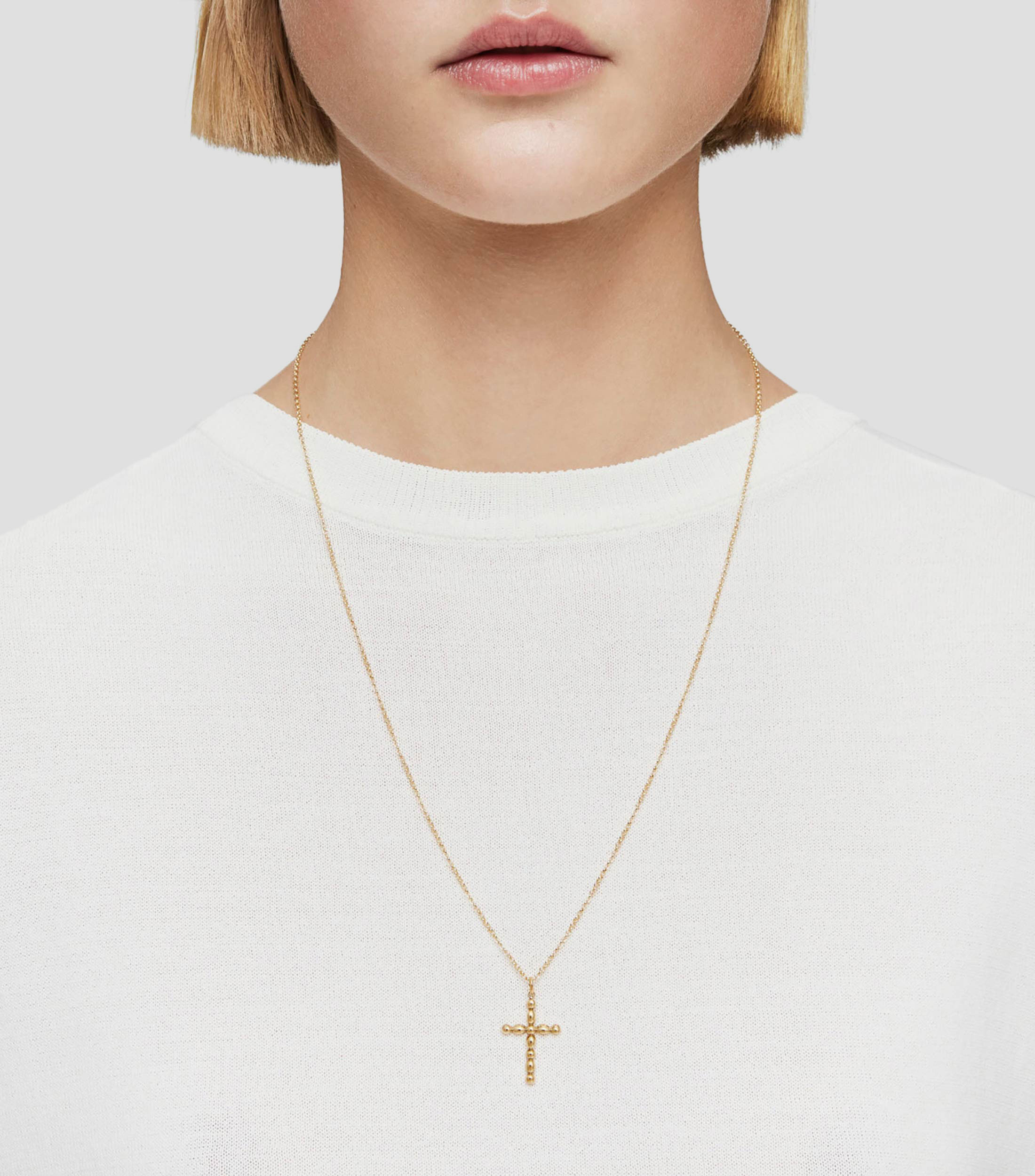 Colgante en Oro Amarillo 18 Kilates cruz Mujer