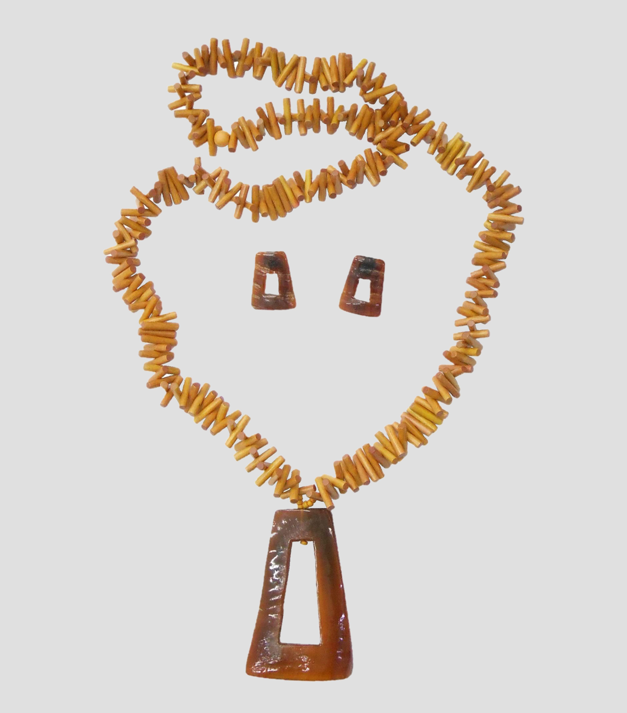 Set collar y aretes Mujer
