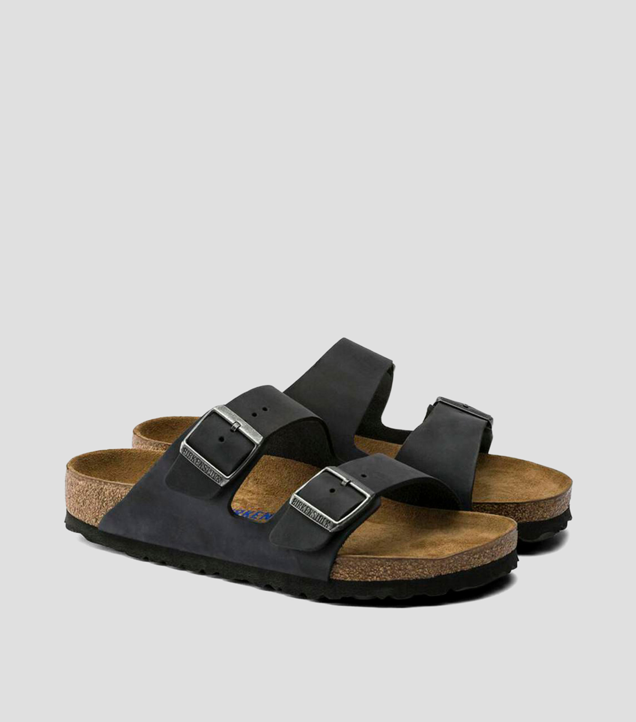 Sandalias planas en piel Mujer