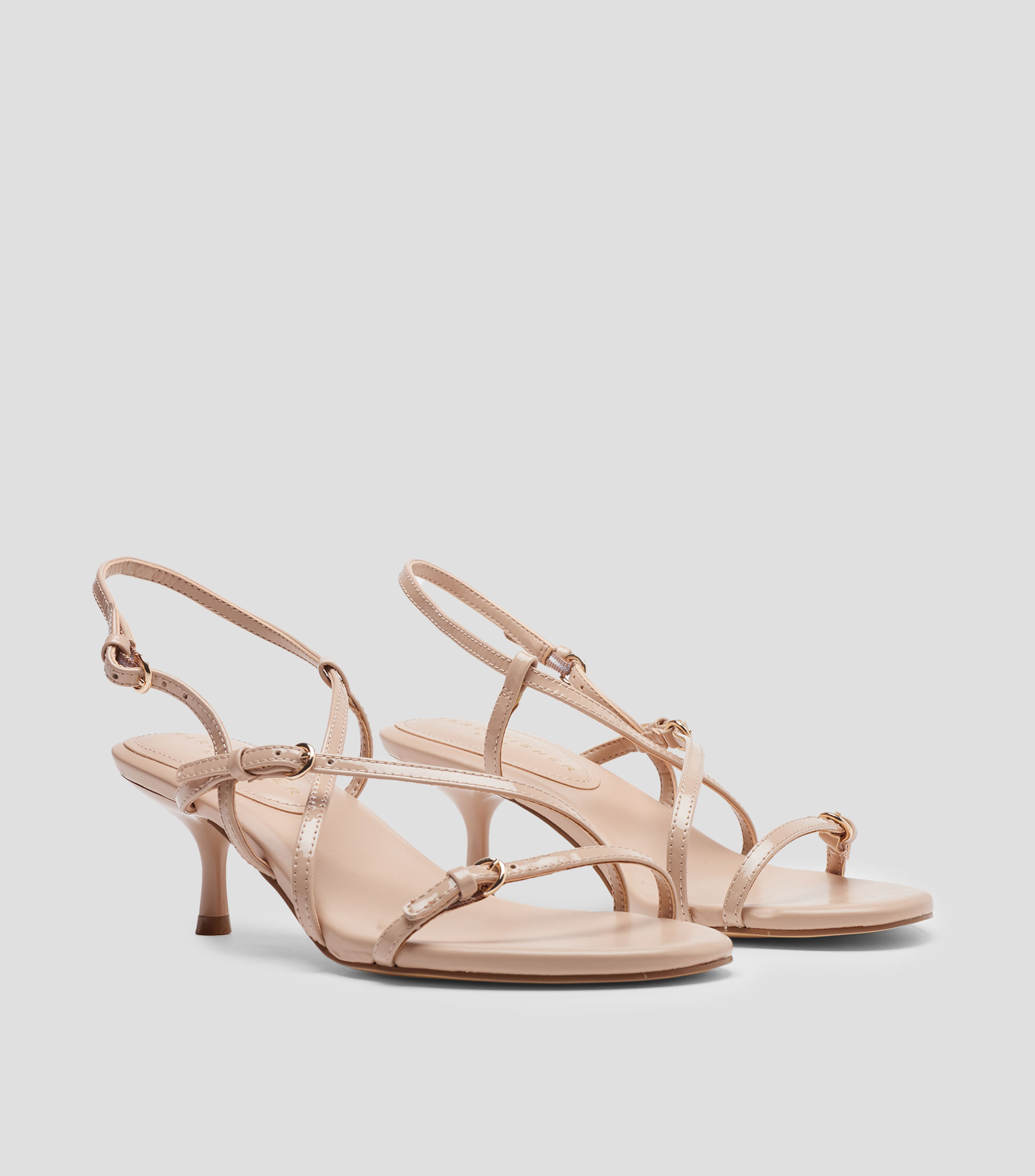 Sandalias con tacón bajo de aguja Mujer