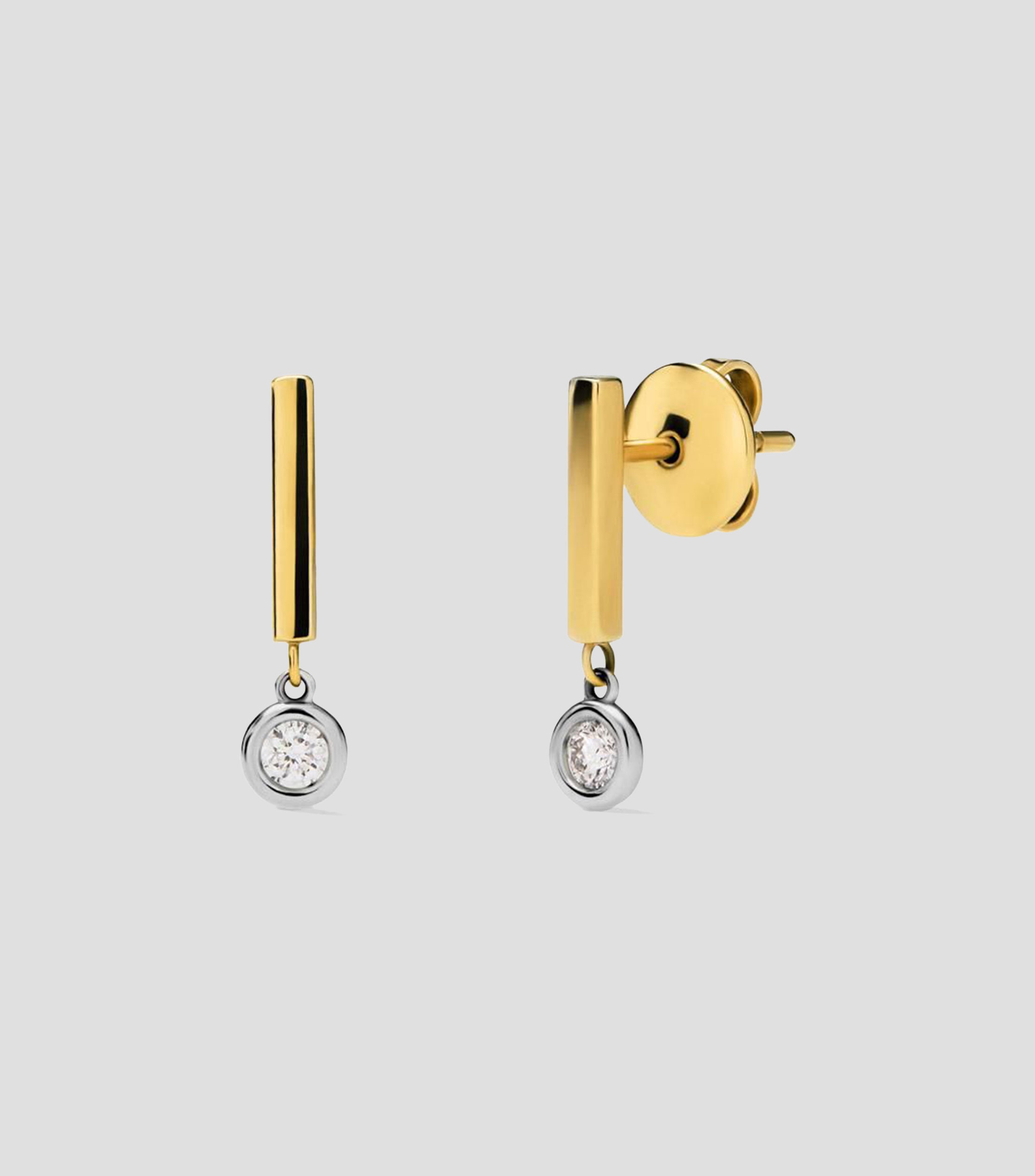 Aretes en Oro amarillo de 18 Kilates con 2 diamantes en talla brillante Mujer