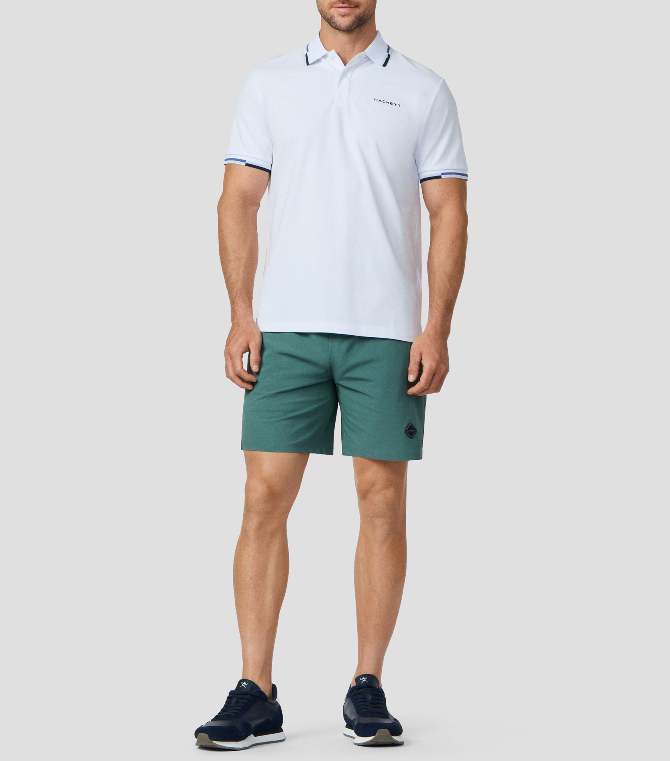 Playera tipo polo de manga corta lisa Hombre