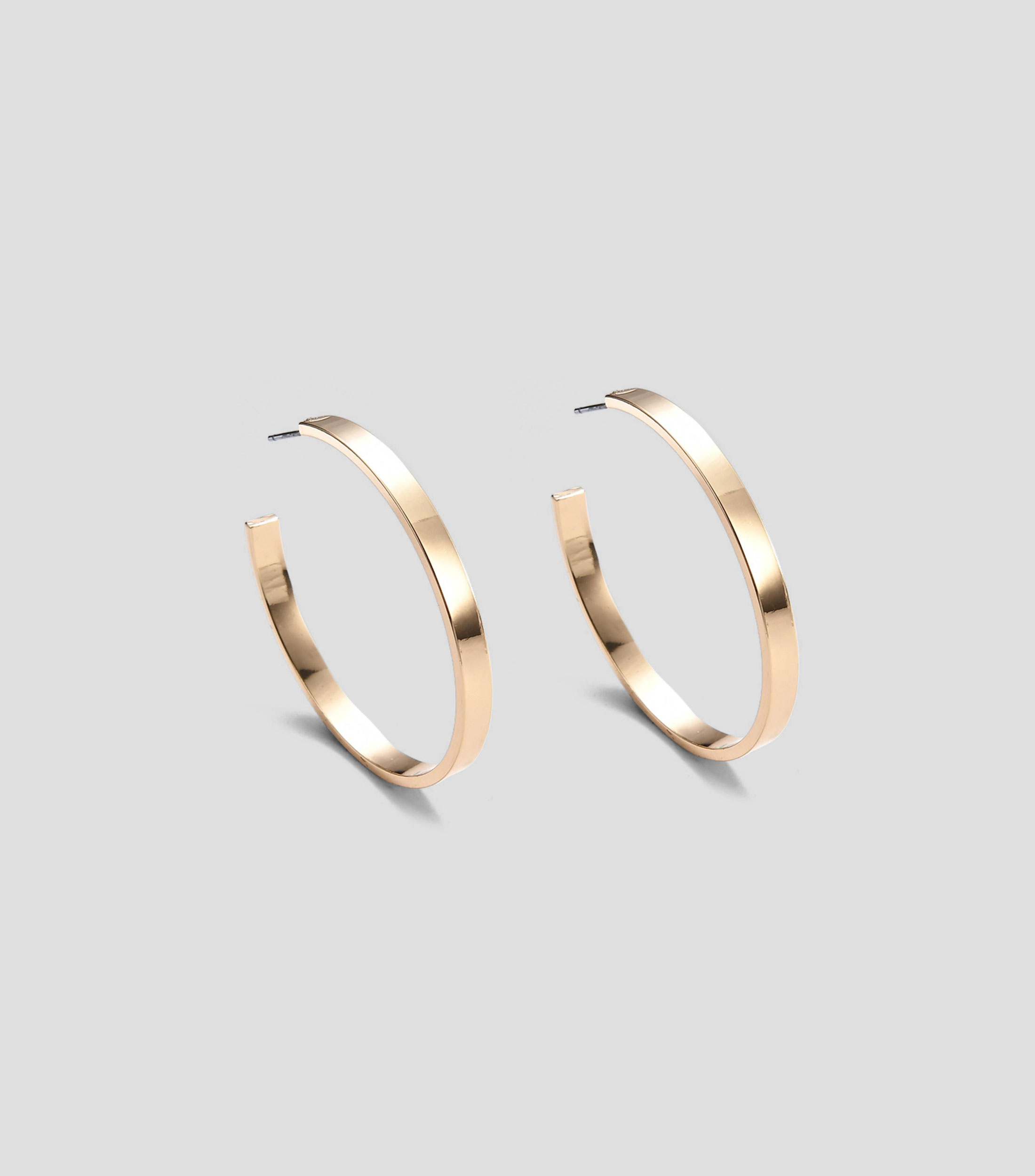 Arracadas de metal en forma circular plana Mujer