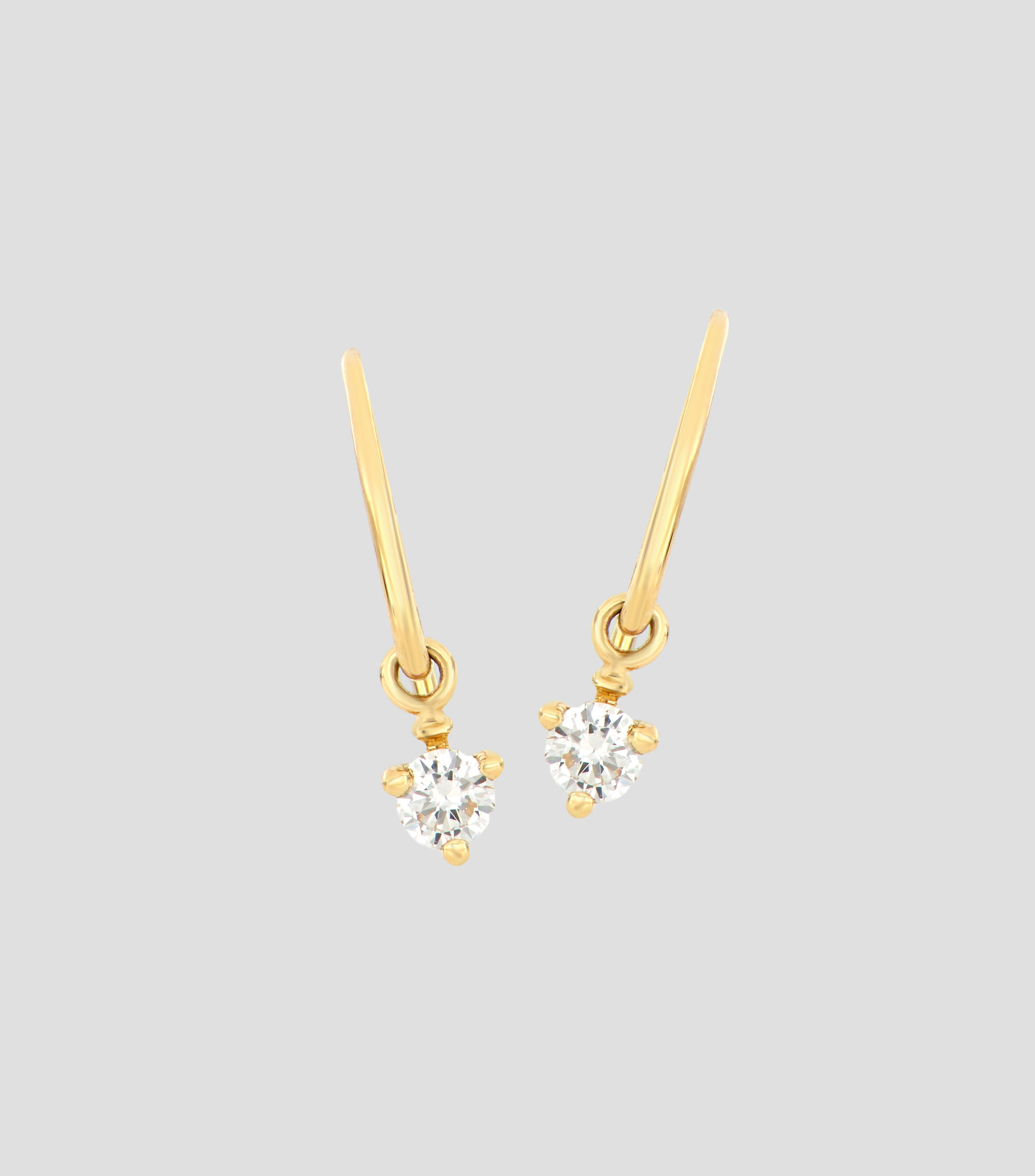 Aretes en oro amarillo de 18 Kts con diamante Mujer