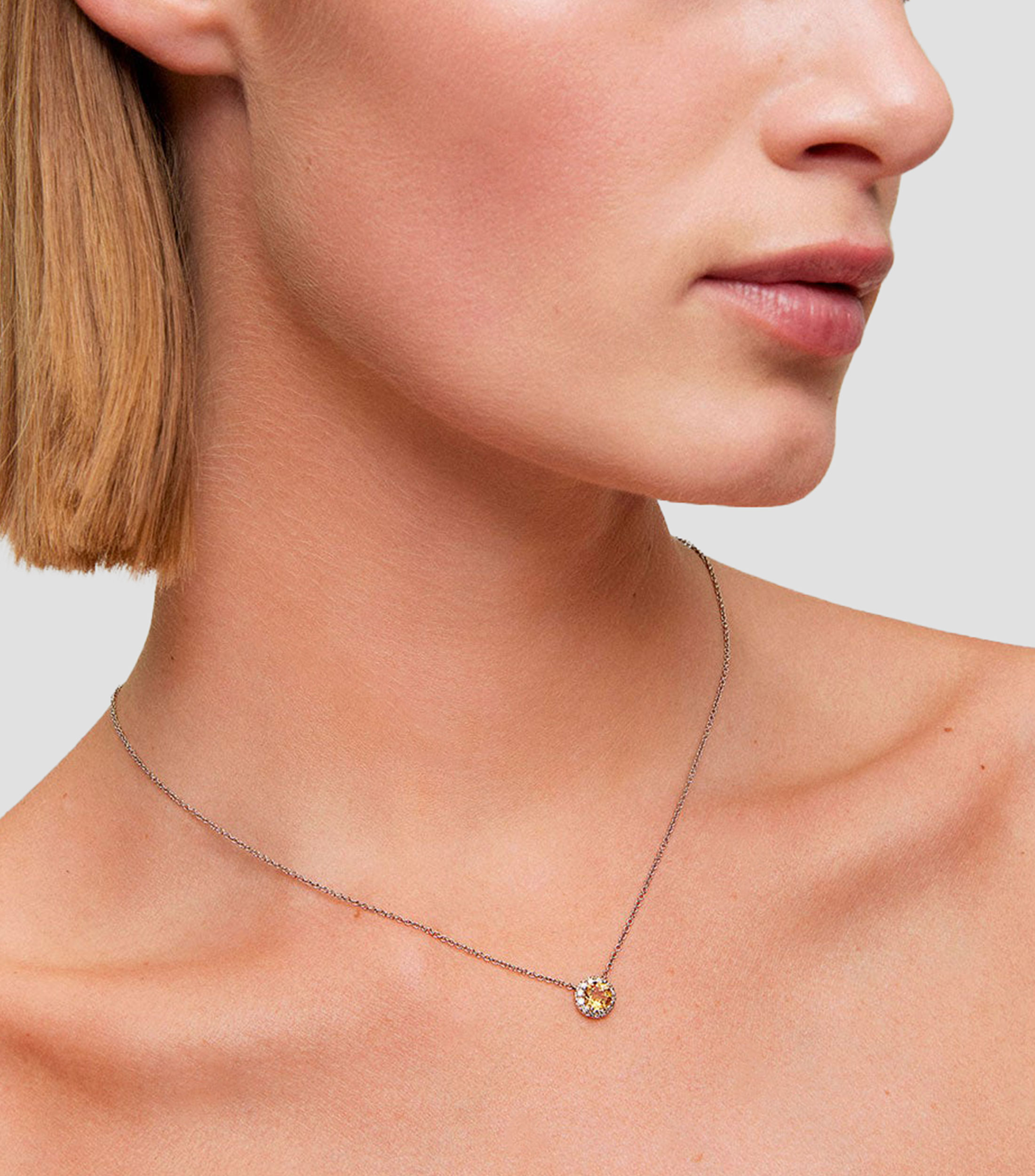 Collar oro blanco de 18 kilates con dije de cuarzo citrino Mujer
