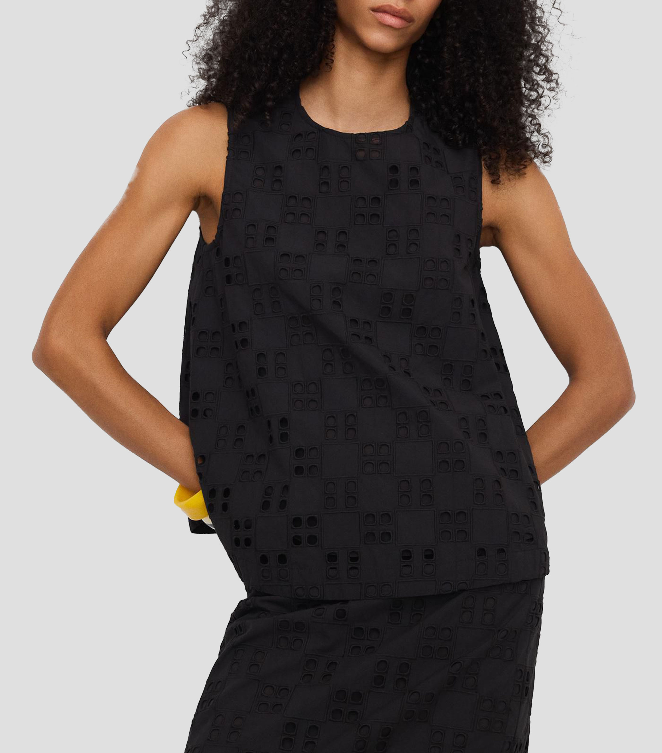Blusa lisa sin mangas Mujer