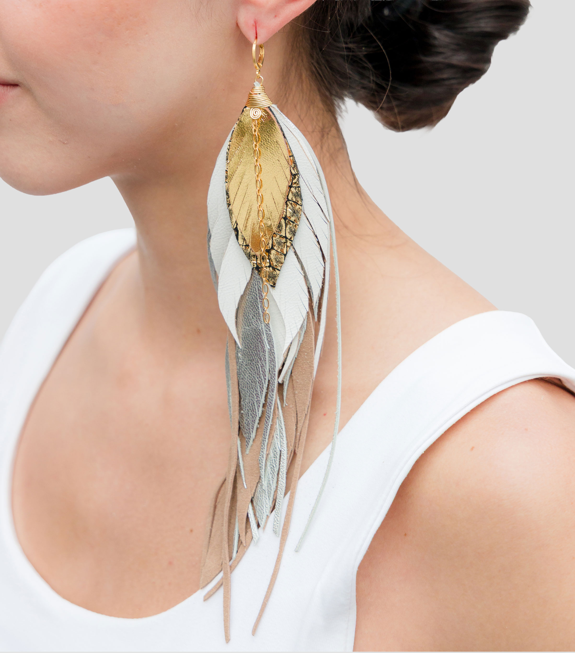 Aretes garza blanca Mujer