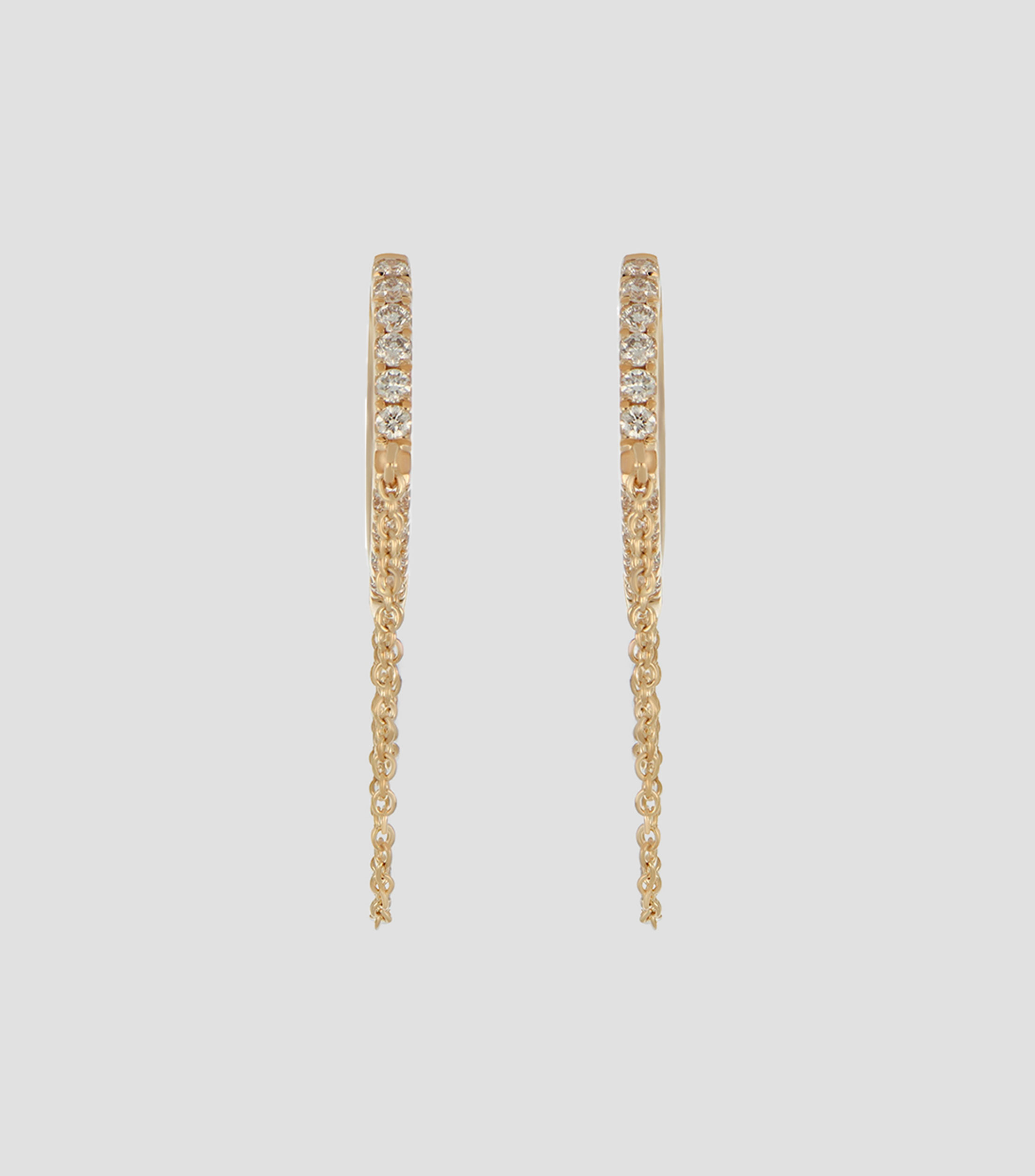 Aretes en oro de 18 kilates con diamantes Mujer
