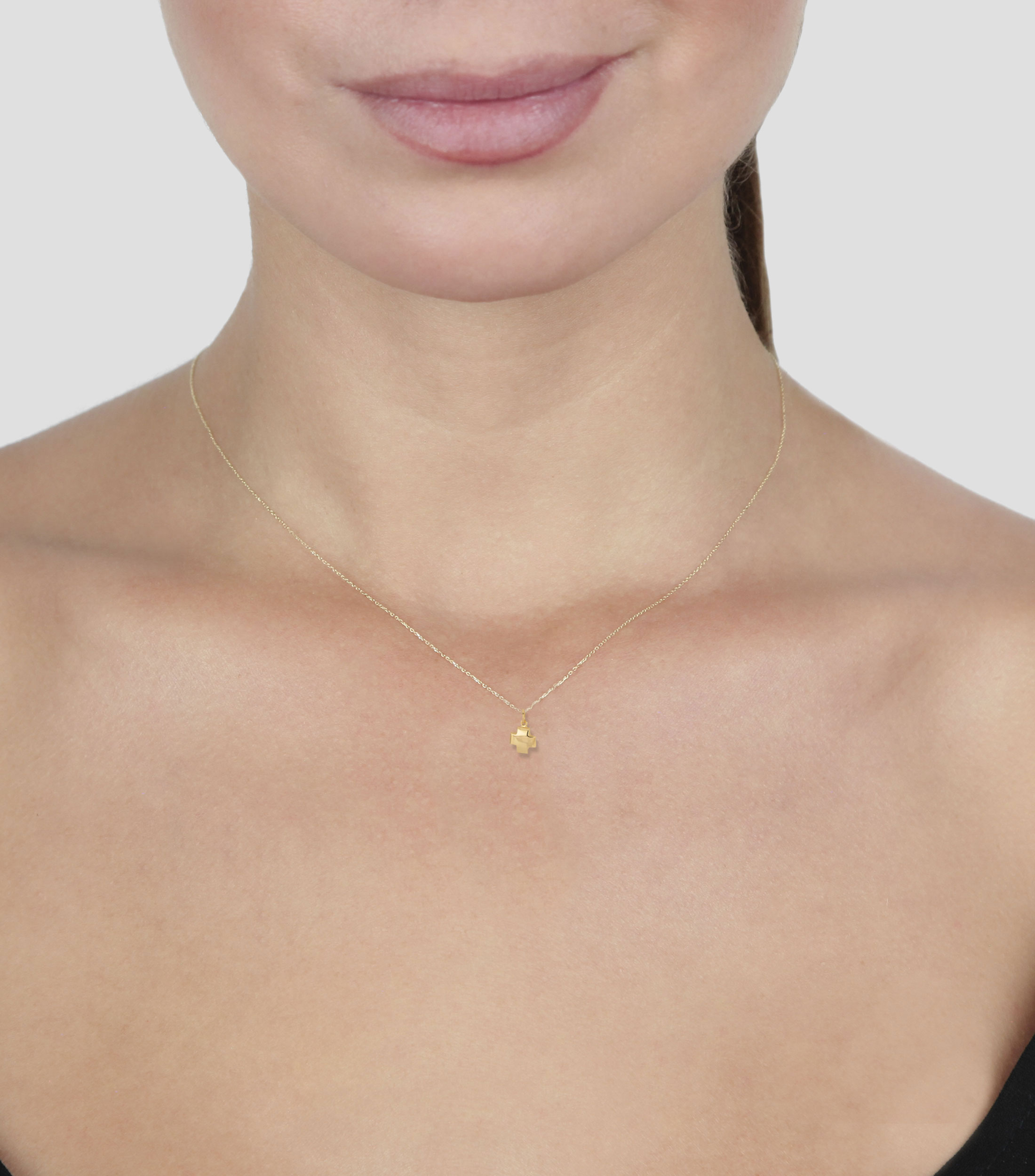 Dije en Forma de Cruz en Oro de 14 Kilates Mujer