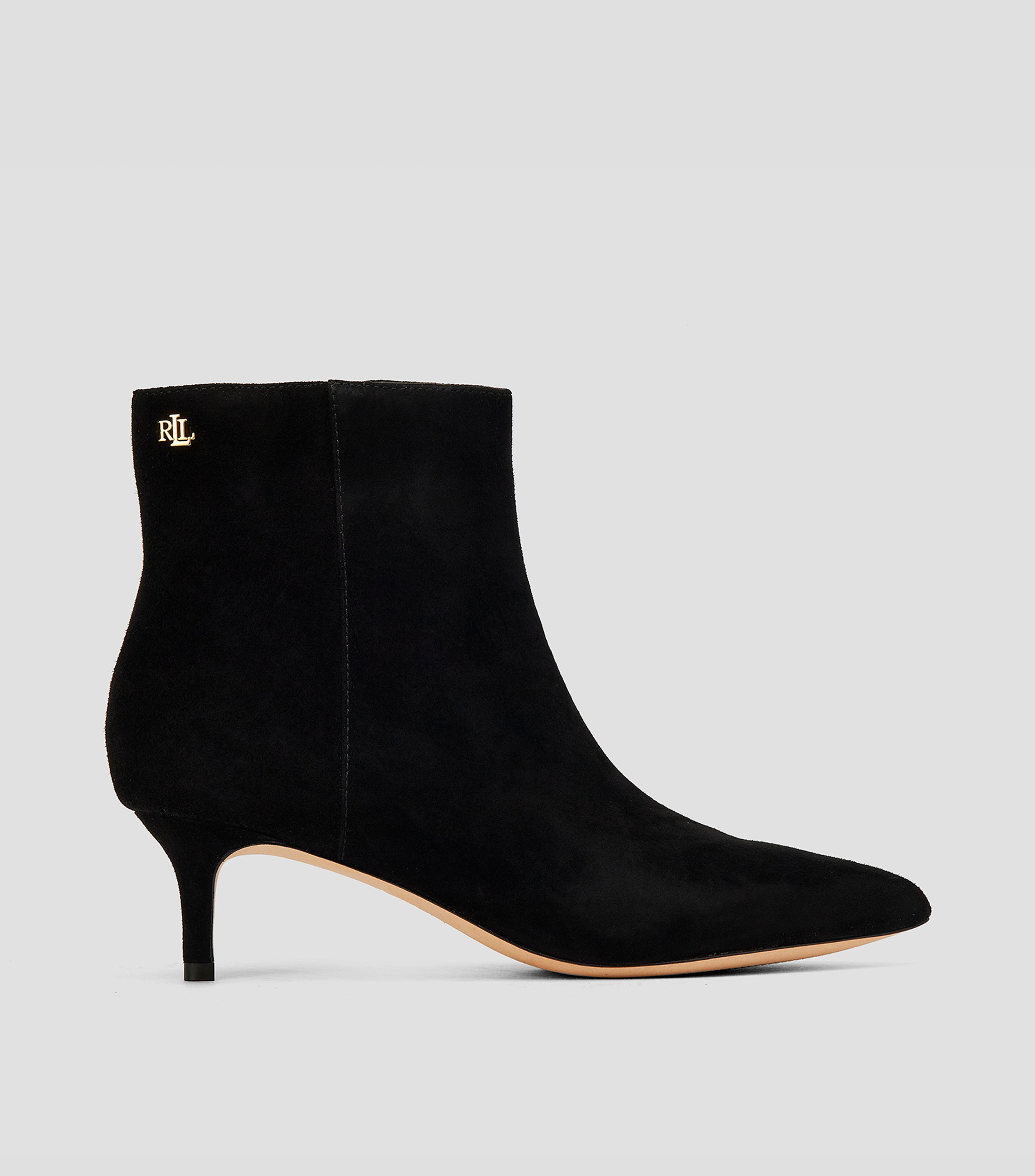Botines casuales en piel con tacón bajo aguja Mujer