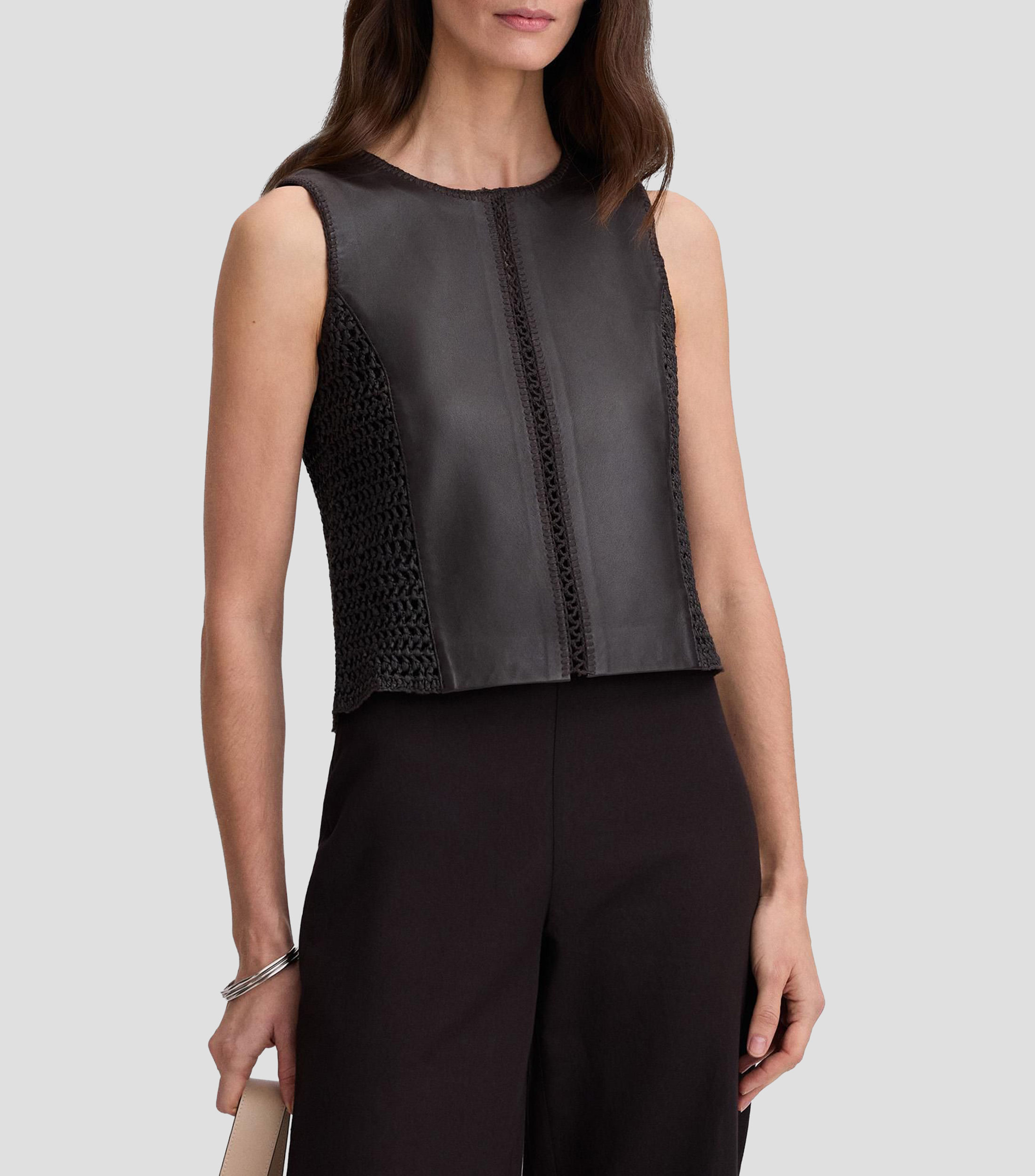 Blusa lisa sin mangas Mujer