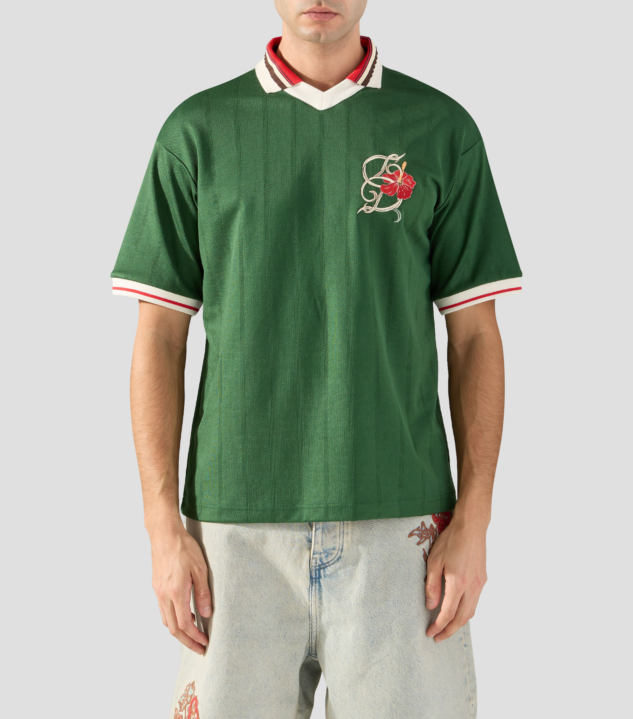 Playera tipo polo manga corta a rayas Hombre