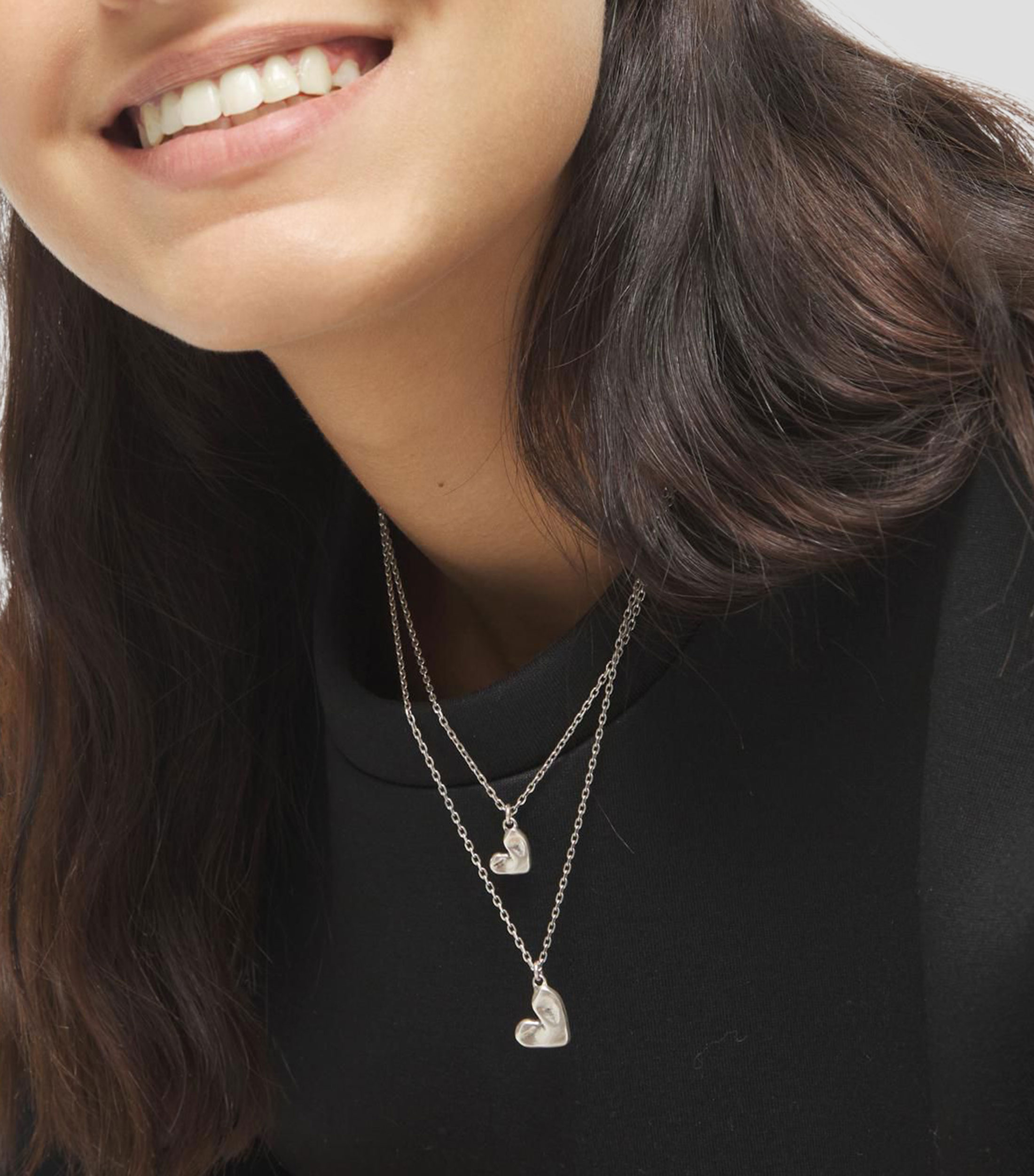 Collar doble con corazones Mujer