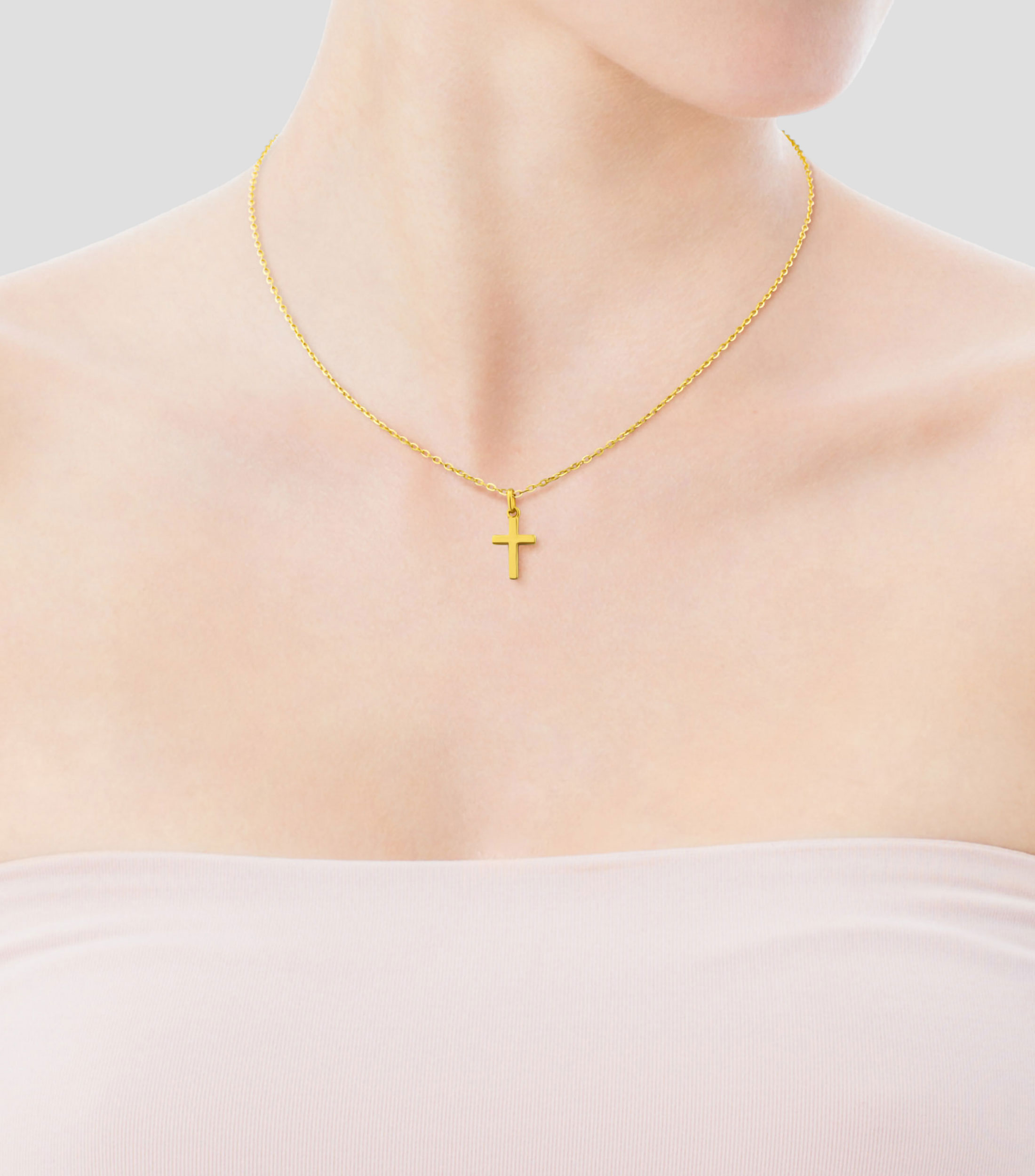 Colgante cruz en oro amarillo de 18 kilates Mujer