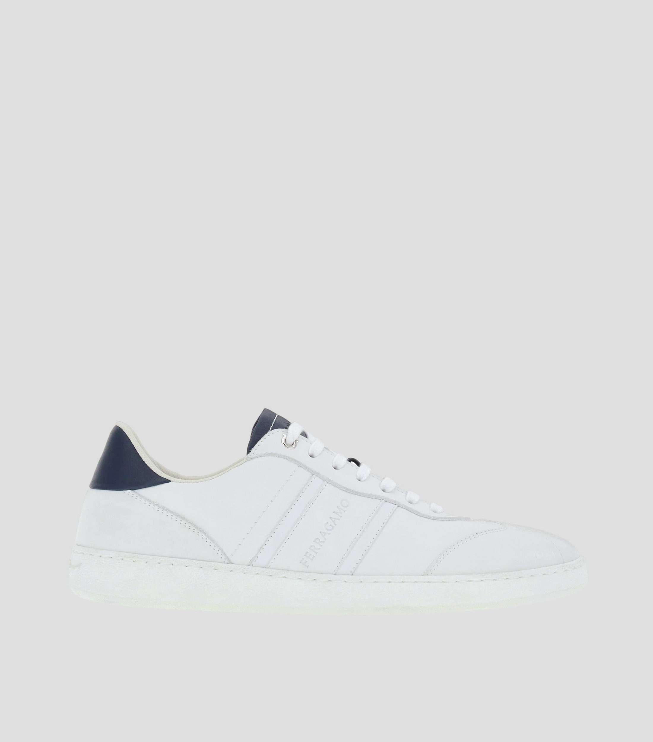Tenis bajos con firma Hombre