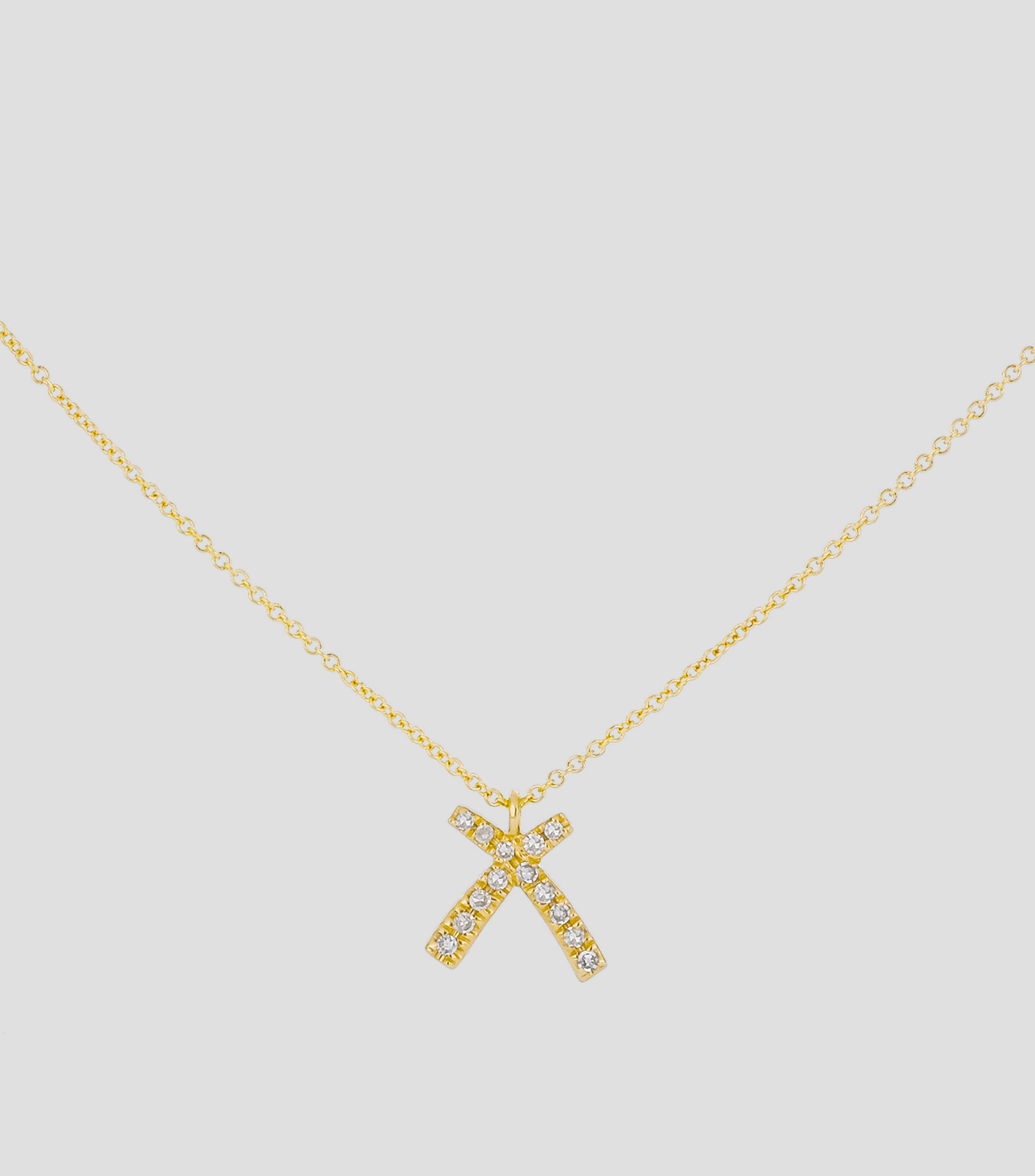 Collar en oro amarillo de 14 Kts con diamantes Letra quotXquot Mujer